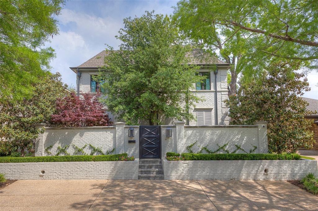 This exquisite beautifully decorated home is the perfect lock and leave with so much to offer.  A huge living area with a floor to ceiling fireplace opens to an outdoor patio and has an additional living area adjacent which boast an open concept.  The gourmet kitchen is equipped with top of the line appliances, designer finishes and a large dining area.  this home has four en suite bedrooms including two masters, one downstairs and one upstairs.  Additional amenities include gated entrance, a front patio with firepit, patio off of living areas, beautiful bar, ample storage, two car rear garage, security system.