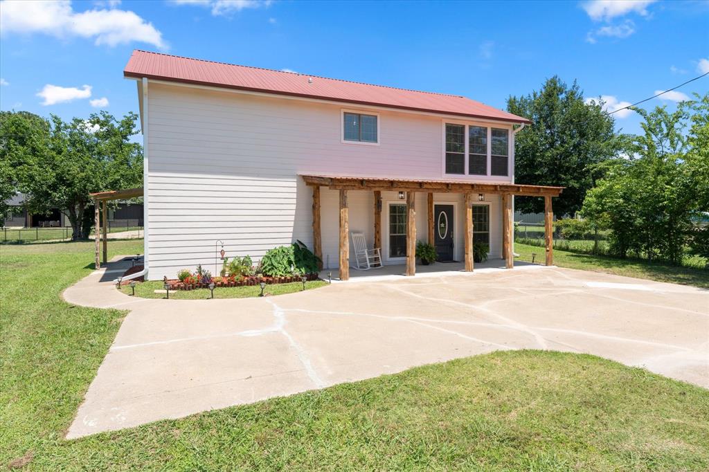 Welcome to your fully updated lake retreat in Trinidad on the shores of Cedar Creek Lake! 
Enjoy semi-private access to a boat dock and swimming beach shared by five houses. The dock is under 100 feet from the home, with opportunities for boating and fishing right from the dock.  
This beautifully renovated 3-bedroom, 2-bath home offers 2,038 square feet of light-filled living space with stylish upgrades throughout.
The stunning kitchen has been completely updated and features quartz countertops, stainless steel appliances, a pantry, and modern finishes that blend beauty and functionality. Recently installed high-end laminate flooring flows throughout the home, complementing the soaring cathedral ceilings and expansive windows that flood the living areas with natural light.
Both bathrooms have been thoughtfully renovated with updated fixtures and finishes. The spacious layout includes a large downstairs game room—perfect for entertaining, hosting guests, or creating the ultimate media space.
Step outside to a 12' x 10' deck just off the living room, ideal for morning coffee or evening sunsets. With access to a peaceful lake tributary, you’ll enjoy the best of lake living—whether it’s kayaking, fishing, or simply relaxing by the water.
This move-in-ready Cedar Creek Lake property combines modern updates, flexible living space, and tranquil waterfront access—don’t miss your opportunity to make it yours!