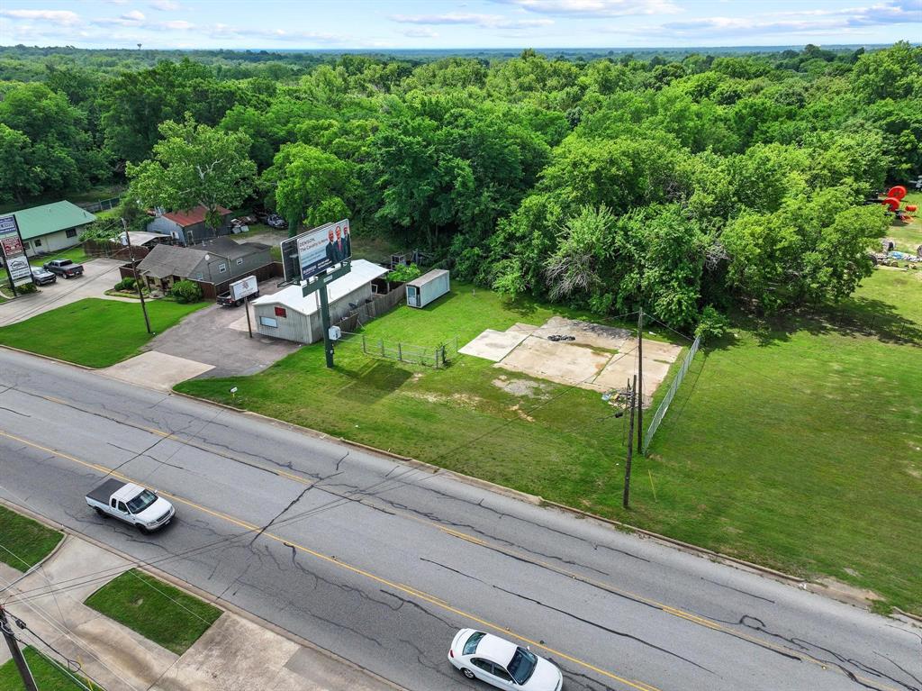 Exceptional commercial opportunity in one of Denison’s fastest-growing corridors! This approximately .22-acre lot offers outstanding visibility and accessibility along highly traveled FM 120, just minutes from the Hwy 75 and FM 120 intersection. Featuring two existing curb cuts, the property provides excellent ingress and egress potential, making it ideal for a variety of commercial, retail, office, or service-oriented uses. Positioned in the heart of continued growth and development, this site benefits from close proximity to major national retailers, restaurants, medical facilities, hotels, and expanding residential developments throughout the Denison and Sherman market. The nearby Hwy 75 corridor continues to see substantial commercial expansion and infrastructure investment, helping drive increased traffic counts and long-term growth potential for the area. Opportunity to secure a high-visibility commercial lot in an area experiencing significant ongoing development and economic growth. Buyer to verify zoning, utilities, and development requirements.