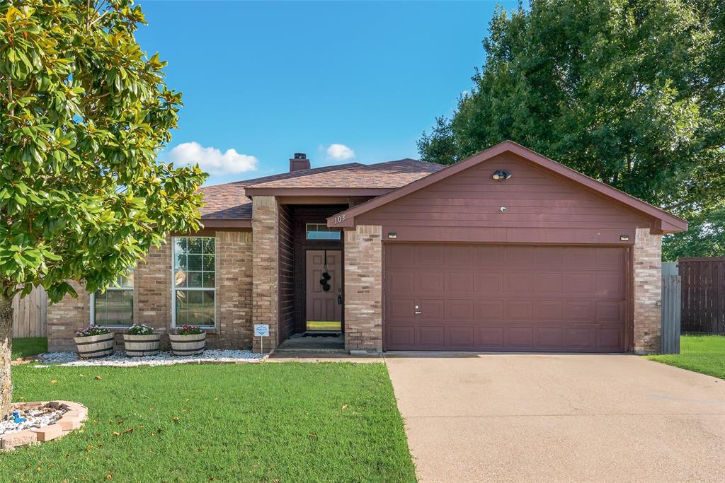 Affordable and move in ready with no HOA!! Nestled on a quiet cul-de-sac in desirable Waxahachie, this charming home offers comfort, convenience, and value. The spacious living room features a brick woodburning fireplace, creating the perfect space for relaxing or entertaining guests. The kitchen is equipped with granite countertops, stainless steel appliances, a smooth top range, builtin microwave, and plenty of workspace for meal preparation. Enjoy meals in the separate dining area overlooking the backyard.The split-bedroom floor plan provides added privacy, while the primary suite offers a huge walk-in closet and an ensuite bath with dual sinks, garden tub, and separate shower. Stained concrete flooring throughout the main living areas adds style and easy maintenance. Step outside to the covered patio and enjoy the oversized fenced backyard with plenty of room for pets, play, or future outdoor projects. Conveniently located near shopping, dining, major highways, and the elementary school. Don't miss this opportunity to own an affordable home in a great location!