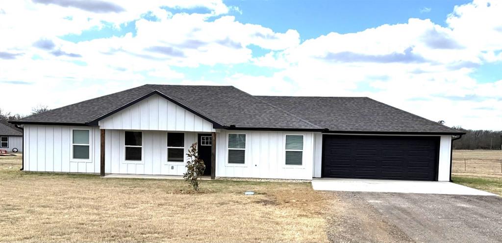 Custom-built 3-bedroom, 2-bath home with a 2-car garage situated on a spacious 0.53-acre cul-de-sac lot just minutes east of Paris, TX off Hwy 82. This beautiful home offers stunning country views and a peaceful setting perfect for enjoying the outdoors.

The open-concept floor plan features a bright living area with beam ceilings and abundant lighting. The kitchen is designed for both style and function, offering an abundance of cabinetry, gorgeous quartz countertops, a farmhouse sink, and a pantry for extra storage.

Stained concrete flooring flows throughout the home, complemented by a split-bedroom arrangement for added privacy. The primary suite includes an ensuite bath with granite countertops, double vanities, and a large walk-in shower.

Located in a quiet addition with scenic views, this home is ideal for families or anyone seeking comfort, space, and country living close to town.