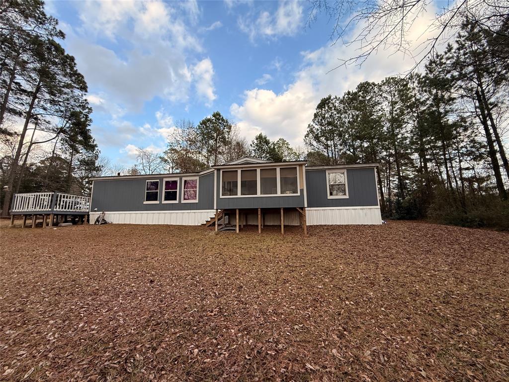 Manufactured Home – 3 Bed, 2 Bath Tucked away on a secluded lot, this 3-bedroom, 2-bath manufactured home offers peace, privacy, and room to breathe. Surrounded by woods with minimal nearby traffic, it’s the kind of place you go to get away from people. Enjoy a closed-in porch—perfect for morning coffee, watching wildlife, or just sitting quiet and letting the world stay somewhere else. Highlights: 3 bedrooms, 2 full baths Secluded, private setting Lots of natural privacy Enclosed porch overlooking the woods Ideal for those who value quiet over crowds If you want neighbors close enough to hear breathe, this isn’t it. If you want privacy and calm, this one checks the box.