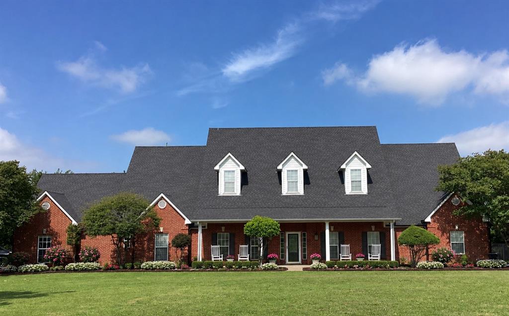 Beautifully remodeled home on 4.9 acres with a 40x60 SHOP with water and electric! All the current colors and finishes are found in this country estate. Large open kitchen offers granite countertops and opens to the family room with fireplace and built-ins. Wall of windows brings in tons of light and a view of the countryside. Oversized master has two closets and spa like bath with free standing soaking tub and fabulous shower! 4th bedroom could be a great office. Two living areas and large dining room. So many options for this floorplan. Screened in porch for enjoying the outdoors without the bugs. Large covered patio for grilling and entertaining. Easy access to I30, 205, John King, shopping and restaurants. This home will not disappoint and is located close to town.  Outside living has had furniture added to show space options and shop is not vacant