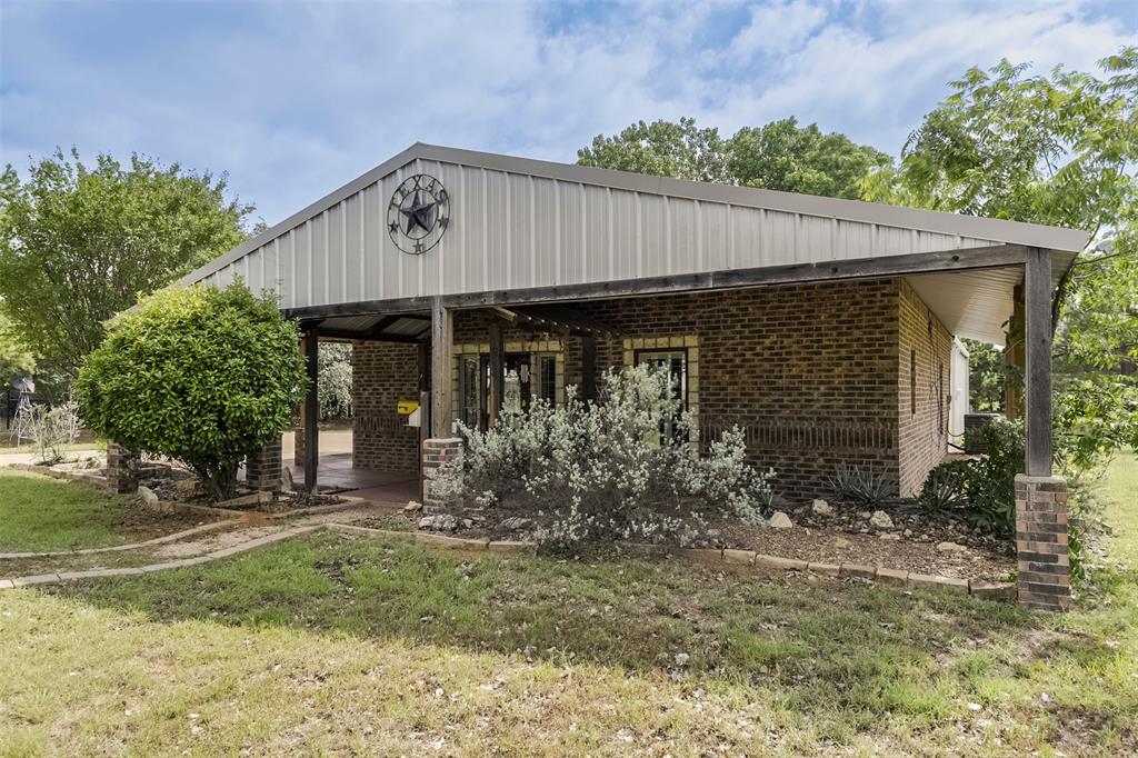 Welcome to 3625 Carla Court in the desirable Nassau Bay community of Granbury, Texas! Nestled on a quiet street and located directly across from a small grass airport community, this property offers a unique lifestyle opportunity for aviation enthusiasts or anyone who appreciates wide open views and a relaxed atmosphere. 

Just minutes from Lake Granbury, you’ll enjoy quick access to boating, fishing, and lakeside recreation while still being conveniently close to everyday amenities. The home is only a few minutes from Hwy 377, providing easy access to shopping, restaurants, local stores, and H-E-B for groceries and essentials. One of the standout features of this property is the attached garage that also serves as a spacious workshop — perfect for hobbies, projects, storage, or workspace needs. Whether you enjoy woodworking, mechanics, crafting, or simply need extra room, this flexible space adds incredible functionality to the home.

Located in Granbury, the county seat of Hood County, you’ll also love being near the historic downtown square featuring the courthouse surrounded by charming boutiques, wineries, restaurants, live entertainment, and local bars that make Granbury one of North Texas’ most beloved destination towns. This home combines small-town charm, convenience, and lifestyle all in one exceptional location.

Rustic home has great style and character. Stained concrete floors, metal roof, porches all the way around the house, great room is open to kitchen and perfect for entertaining. If you want something that is extremely energy efficient and NOT the same as every other house on the block this is a must see. Situated on a 1+ acre lot with towering trees in the backyard, space for a garden and future expansion, even the garage is insulated which makes for a terrific workshop.