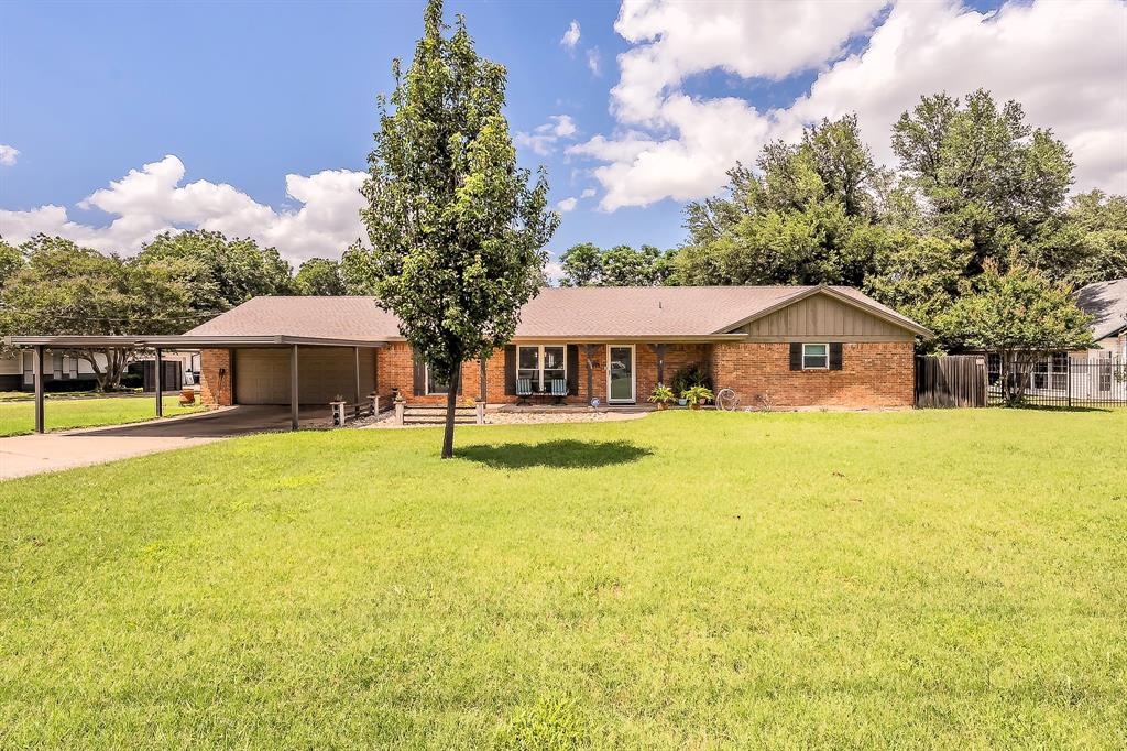 Welcome home to this beautifully updated 3 bedroom, 2 bathroom home on a half-acre lot in desirable River Oaks offering the perfect blend of affordability, space, and convenience just steps from Fort Worth's thriving River District. Extensively renovated in 2021 and enhanced with over $50,000 in additional improvements, this move-in-ready property delivers modern comfort, flexible living spaces, and exceptional outdoor amenities. Inside you'll find a bright open-concept floor plan featuring a spacious living area with abundant entertaining options and a custom fireplace mantel housing the concealed wires. The designer kitchen showcases quartz countertops, soft-close cabinetry, custom drawer organizers, hidden secure storage, and an oversized walk-in pantry with exceptional storage capacity. A newly added sunroom provides additional living space perfect for relaxing, entertaining, or a home office. The private primary suite features a spa-inspired bathroom with a walk-in shower, spot-free glass, smooth-glide door, and extensive storage. Two additional bedrooms and a jack-and-jill style full bath offer flexibility for family, guests, or work-from-home needs. Step outside to your backyard retreat featuring a pool-sized yard, established gardens, fenced dog run, inviting gazebo, charming guest house and workshop with electricity, and a double gate. Additional parking includes an expansive driveway, attached carport, and garage with a secondary shop area. Enjoy an unbeatable location just 10 minutes from Downtown Fort Worth, 10 minutes from the Stockyards, 10 min to Lockheed, 5 minutes to the military base, and steps to the Trinity Trails. Walk to the local community center, park, schools, and highly regarded Castleberry High School with a new addition, tech center, and top-rated fine arts program. This unique property offers space, functionality, and location rarely found at this price point. Discover why River Oaks continues to be one of Fort Worth's best-kept secrets!