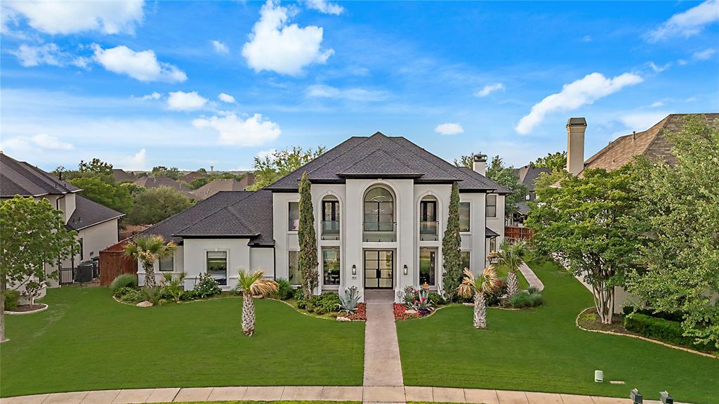 4824 Longvue Drive – The Pinnacle of Luxury Living. Where elegance meets comfort in this stunning estate, nestled within the prestigious gated community of The Lakes on Legacy. Situated on over half an acre of meticulously landscaped grounds, this home offers an unparalleled lifestyle defined by space, style, and sophistication. Step through the grand foyer with soaring ceilings and take in the view of the lush backyard oasis beyond. Every inch of this home has been thoughtfully updated with top-of-the-line finishes, blending timeless design with modern luxury. The expansive primary suite is a true retreat, featuring a spa-inspired en-suite bath complete with an elevated soaking tub, oversized shower, and premium fixtures. The chef’s kitchen is a culinary dream, outfitted with high-end appliances, custom cabinetry, and an open layout that flows seamlessly into a secondary living space and bar—perfect for entertaining. Massive sliding glass doors open up to a resort-style backyard, where you’ll find a sparkling swimming pool with integrated spa, a covered lounge area for alfresco dining, and even a private basketball court for recreation. Located in a prime area close to top schools, shopping, and dining, 4824 Longvue Drive offers the rare opportunity to own a home that truly has it all.