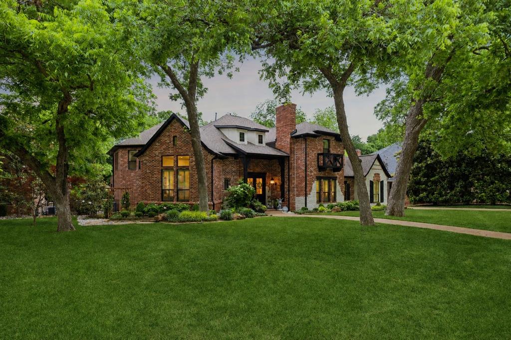 Stunning and meticulously refined, this custom-remodeled estate on Pecan Trail leaves no expense spared. Perfectly positioned on a massive, heavily treed creek lot, the property serves as a private, professionally landscaped sanctuary. The grounds are an outdoor masterpiece, featuring a full-turf backyard for effortless maintenance and custom raised garden beds for the hobbyist.Stepping inside, the two-story brick home unfolds into an expansive layout designed for both grand entertaining and quiet privacy. Offering five spacious bedrooms and six bathrooms, the floor plan is anchored by elegant architectural details, including soaring ceilings and classic plantation shutters. This home is as functional as it is beautiful, equipped with a whole-house water filtration system for pristine quality and a whole-house generator to ensure peace of mind in any weather.The true showpiece of the interior is the completely redesigned, culinary dream kitchen. Transformed with modern aesthetics and top-tier functionality, it features high-end appliances, including a gas cooktop, double oven, and a built-in SS refrigerator-freezer. The home’s atmosphere is further elevated by a full home audio system, allowing music to flow seamlessly through the kitchen and living areas. The primary suite and common areas are bathed in natural light through bays of windows, while cozy evenings are centered around two fireplaces.The experience extends outdoors to a spectacular living space, complete with a private pool and spa, a covered porch, and a cooking cabana for year-round enjoyment. Enjoy the natural beauty of the tranquil creek, the estate also features a rare four-car garage. Offering an unmatched combination of custom luxury and high-tech utility, this property provides a private retreat while remaining close to the scenic trails and vibrant amenities of McKinney.