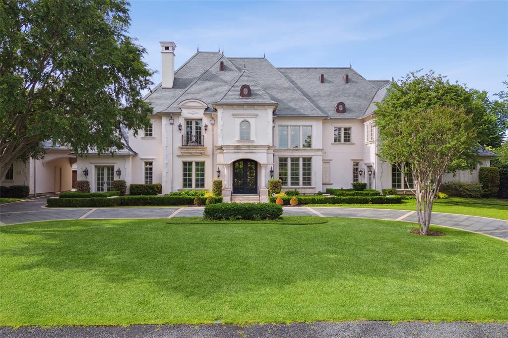 Situated on a 200 ft wide, 1.106 acre lot in the Strait Lane estate area of Preston Hollow, this custom built Sharif Munir home features 13,416 SF of living space with five bedrooms (primary and guest down), six full and four half baths, chef's kitchen, multiple living areas, a handsome library-study, and media room. Step inside to discover a grand entrance with soaring ceilings and abundant natural light that illuminates every corner. The open floor plan seamlessly connects the spacious living areas, making it perfect for both entertaining and everyday living. High-end appliances, custom cabinetry, and a large center island in the kitchen create a culinary haven for any aspiring chef. A lavish primary suite offers a retreat with a spa-like bathroom and dual walk-in closets that will impress even the most discerning buyer. Comfortable living continues to the outdoor sanctuary that features a sparkling pool and spa, covered patio, and lush landscaping.