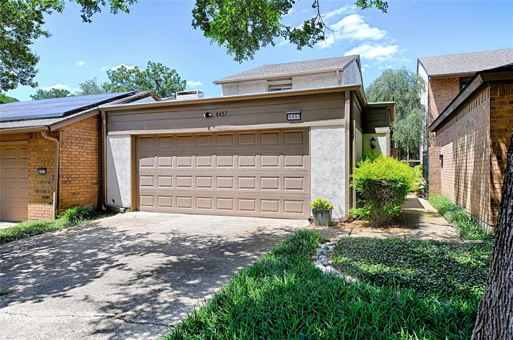 LOCATION! Tucked within one of North Dallas' most desirable townhome communities, this distinctive property offers a rare blend of privacy, character, and convenience. Enter through the iron gate to a charming private courtyard that creates a serene welcome and a sense of retreat from the outside world. Inside, the versatile floor plan features dual primary suites and a dramatic two-story living room anchored by a stunning floor-to-ceiling fireplace. A wall of oversized windows and glass doors floods the home with natural light while framing peaceful views of the private patio. The thoughtfully designed kitchen offers abundant storage and opens to the dining room through an elegant stained-glass divider, adding warmth and architectural charm. The spacious dining area overlooks the backyard and includes additional built-in storage beneath the bar. The first-floor primary suite serves as a private sanctuary, complete with a walk-in closet, ensuite bath, and direct access to the front courtyard. Its flexible design allows the suite to remain connected to the main living spaces or be closed off for added privacy. Upstairs, a loft with custom built-ins provides separation between the main living area and additional bedrooms, creating ideal spaces for work, relaxation, or guests. Surrounded by mature trees, walking paths, and inviting community gathering spaces, this quiet neighborhood offers a peaceful lifestyle just minutes from every convenience. Residents enjoy a low HOA that includes landscaping, along with access to a saltwater pool, outdoor grilling area, and community amenities. Zoned to highly acclaimed Richardson ISD, including award-winning Brentfield Elementary, and conveniently located near parks, shopping, dining, major highways, and Prestonwood Country Club. Washer and dryer are included.