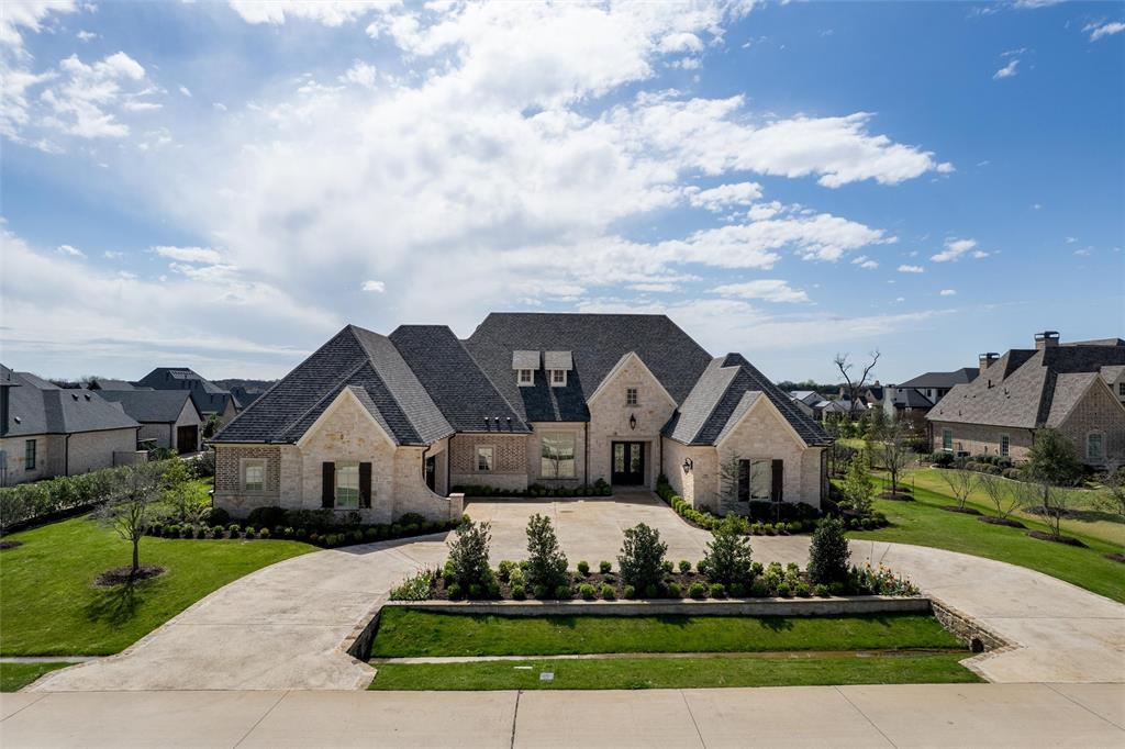 Luxury Living in One of Fairview’s Most Desirable Neighborhoods. Barely lived in and beautifully designed, this stunning custom pool home sits on an exquisite acreage estate in one of Fairview’s most sought-after neighborhoods. Exceptional curb appeal welcomes you with a circular drive and lush landscaping surrounded by an abundance of mature trees, creating a private and tranquil oasis. Step inside to rich wood floors and a beautifully appointed study featuring exquisite designer wallpaper. The expansive living room showcases a striking fireplace and exposed beams and flows seamlessly into the dining area and a truly state-of-the-art kitchen. Designed for both entertaining and everyday living, the kitchen features professional chef-quality Thermador appliances, upgraded custom cabinetry, and an incredible oversized pantry that is truly a dream.The home offers two oversized primary suites, each with dual vanities and premium walk-in closets featuring convenient third-row pull-down rods. All secondary bedrooms include their own ensuite bath and walk-in closet, providing comfort and privacy for family and guests.The media room is an entertainer’s dream, complete with a wet bar and top-of-the-line media equipment valued at $25,000, including a 150” screen with Dolby Atmos 7.2.4 surround sound. Additional highlights include an Energy Star Plus certification, an incredible oversized laundry room, designer lighting throughout, electric window shades, and a 2.5-car garage with professional epoxy flooring. Step outside to your backyard resort-style oasis featuring a self-cleaning pool, expansive patio areas, and a large private yard surrounded by beautiful trees. The covered outdoor living space includes a sink, grill, and two-burner gas cooktop, perfect for entertaining and enjoying the peaceful surroundings.