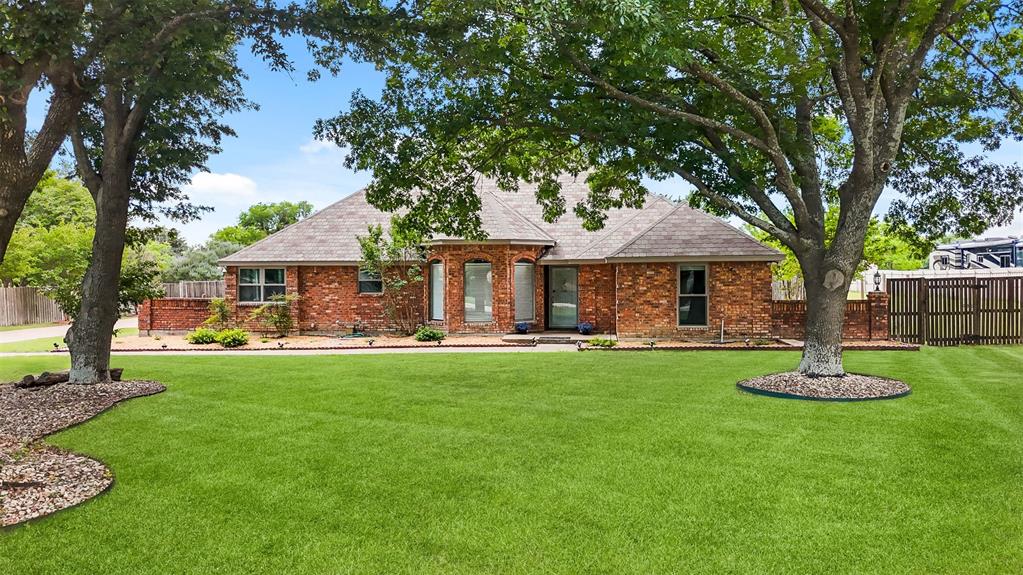 Welcome to 909 Valley View Ave, a charming single-family home nestled in the serene community of Red Oak, Texas. Built in 1986, this spacious residence offers 3 bedrooms and 2 bathrooms across 3,076 square feet of living space, all situated on a generous 0.97-acre lot with 2 sheds. The home has been recently painted both inside and out, providing a fresh and modern aesthetic. Enjoy cooking in the updated kitchen featuring new quartz countertops and a stylish backsplash. New Built-In Microwave. Both HVAC systems are equipped with UV-C germicidal lamps, enhancing the indoor air quality for a healthier living environment. See List of improvements in Transaction Desk. Red Oak offers a variety of amenities that cater to diverse interests: A selection of local restaurants provides a range of culinary experiences. Nearby movie theaters and bowling alleys offer fun activities for all ages. Various shopping centers are conveniently located for all your retail needs. Proximity to hospitals and medical facilities ensures peace of mind for residents. This property combines comfortable living with the convenience of nearby amenities, making it an ideal choice for those seeking a balanced lifestyle in Red Oak.