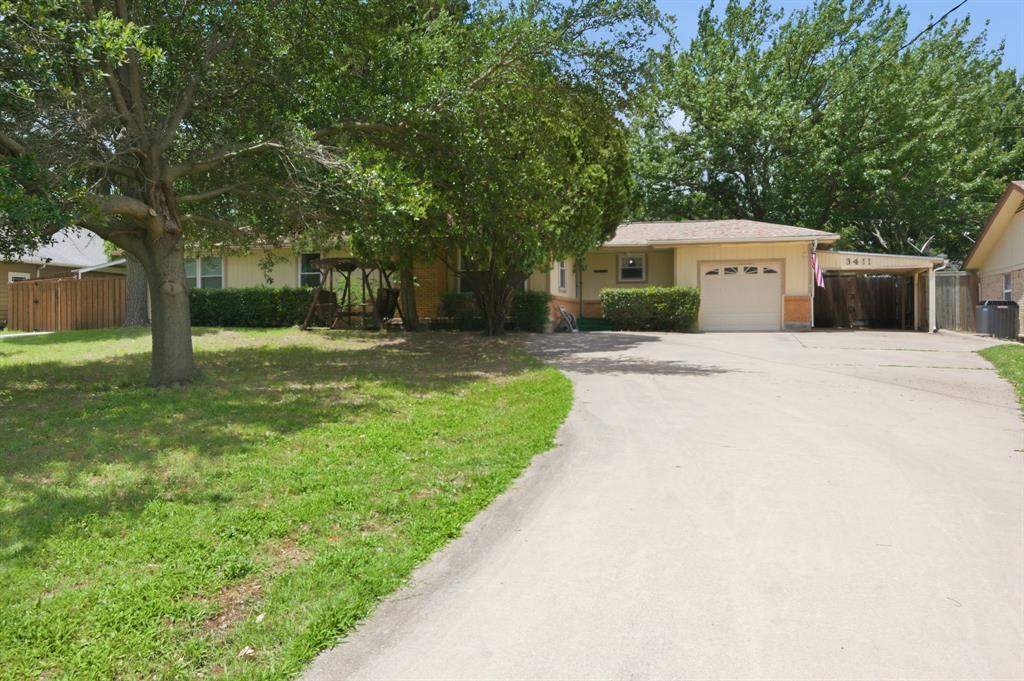 Several options for this home or a nice sized lot in a much desired area of Grapevine near Lake Grapevine. Two carports plus a single car garage compliment this 2 bedroom older home. This is a lock and leave or consider a potential building site. Think of the possibilities!