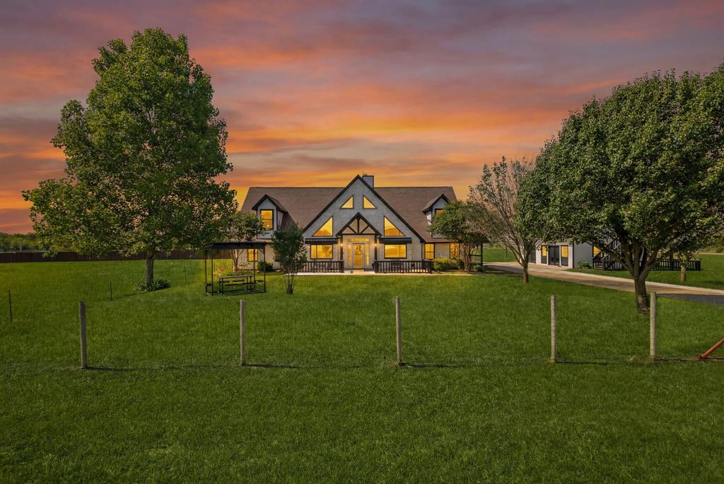 Completely transformed from the inside out, this extraordinary estate on nearly 5 private acres offers a rare blend of luxury, functionality, and multi-generational flexibility with over 5,600 combined square feet between the main residence and detached guest quarters. Purchased in 2025 needing many updates, the home underwent a massive renovation with virtually no surface left untouched. Designed around open-concept living and entertaining, the interior was reimagined by removing walls, relocating the laundry room, and tripling the size of the kitchen to create the centerpiece of the home. Outfitted with top-of-the-line commercial appliances, the kitchen features a 60-inch refrigerator, six-burner range with grill, ice maker, built-in refrigerator drawers, and a butler’s pantry with additional refrigeration and custom cabinetry. Throughout the home you’ll find all-new soft-close cabinetry, luxury vinyl flooring, fresh carpet, upgraded insulation, fresh interior and exterior paint, and all new Pella windows. The main residence offers 4 bedrooms, 3 full bathrooms, multiple living and dining spaces, plus a bonus room ideal for an office or nursery. The primary suite features a custom oversized walk-in closet with built-ins for shoes, jewelry, purses, and more. Bathrooms have been fully remodeled with custom tile showers, glass enclosures, and upgraded vanities. Across the driveway, the detached office and guest residence adds incredible flexibility. Downstairs functions as a professional office with a half bath, while upstairs features a fully renovated 2-bedroom, 2-bath apartment complete with kitchen, laundry, and private living space. Additional upgrades include serviced HVAC systems with four primary units plus two mini splits, a fully operational 36-panel solar system with utility buyback credits, serviced septic and aerobic systems, and a resort-style pool. A truly one-of-a-kind property where nearly everything is new and thoughtfully redesigned.
