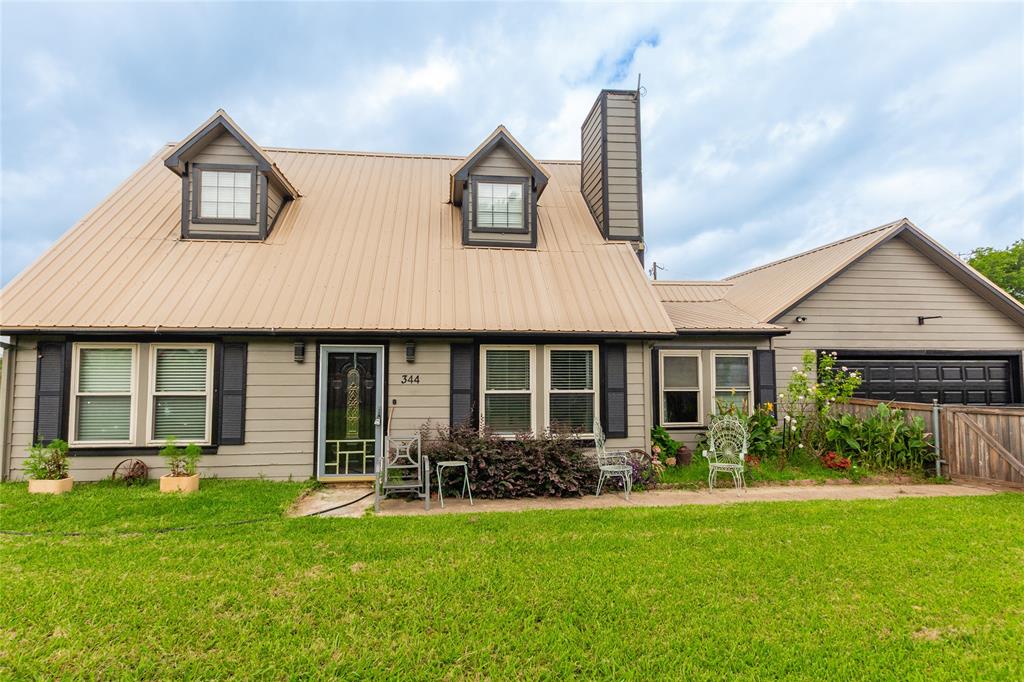 Welcome to this stunning 4-bedroom, 2.5-bathroom home offering 1,329 square feet of beautifully designed living space (2195 Sq Ft. Under Roof) with a breathtaking backyard retreat and distant views of Lake Tawakoni. From the moment you arrive, the home’s charming curb appeal and inviting front entry set the tone for the beauty found throughout.

Step inside to a bright, open floor plan filled with natural light and modern touches. The spacious living room features a gorgeous furnace-style fireplace, creating a warm and welcoming focal point. The open kitchen offers plenty of counter space, unique fixtures, and stylish finishes that pair perfectly with the home’s color palette. The dining area is equally lovely, surrounded by windows that bring in abundant natural light.

A charming sunroom sits just off the main living spaces, offering panoramic views of the backyard and peeks of the lake—an ideal spot for morning coffee, reading, or simply relaxing.

Each bedroom is generously sized, and all bathrooms are beautifully updated with a clean, modern feel. The layout is designed for both comfort and functionality, making the home perfect for everyday living.

Outside is truly where this home shines. The expansive backyard features a large deck area, perfect for entertaining, along with a refreshing pool and peaceful views stretching toward Lake Tawakoni. Whether you're hosting guests or enjoying quiet evenings outdoors, this space offers a serene escape.

This beautifully crafted home combines charm, style, and comfort—inside and out—making it the perfect