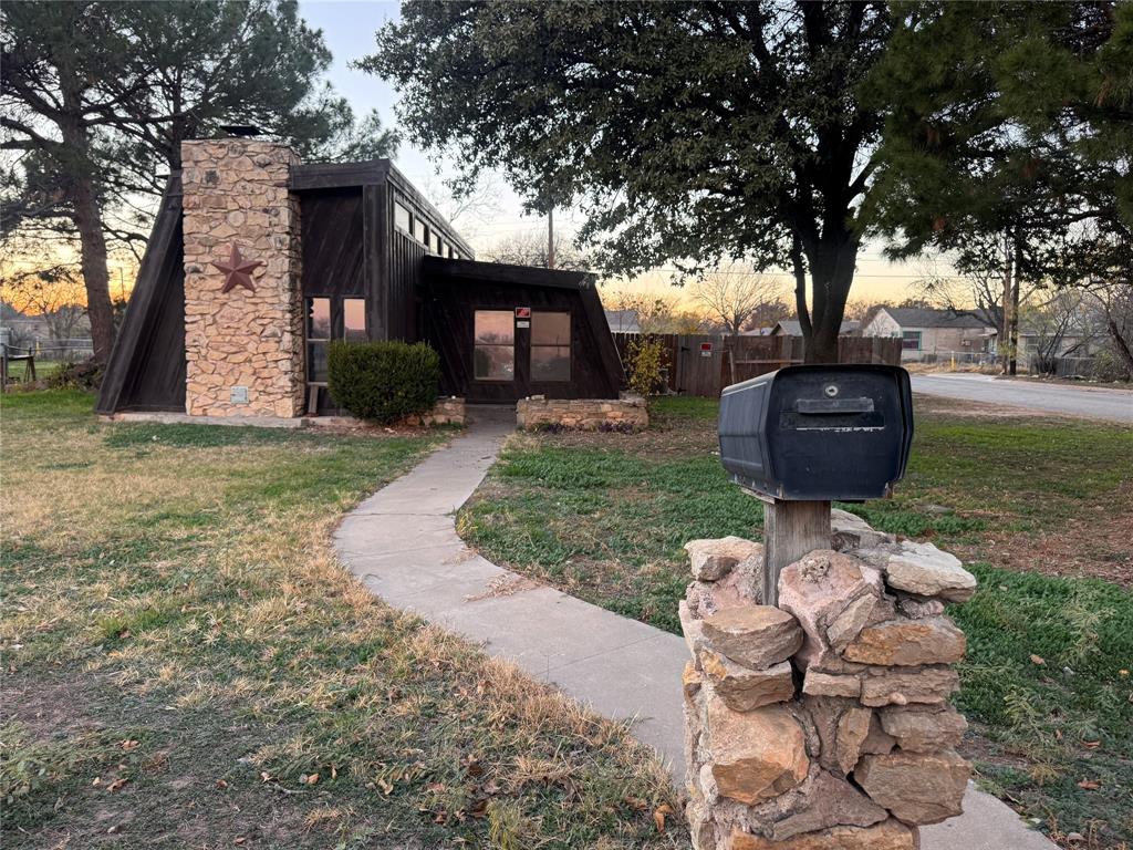 A Beautiful 3-bedroom, 1-bath home offers living space with soaring 20-foot ceilings in the main living room, with an incredible floor-to-ceiling, natural stone fireplace, creating an open, spacious feel filled with natural light. This move-in-ready home features an unfinished bonus room to creating instant equity and extra flexibility, making it ideal for a fourth bedroom, home office, game room, or second living area. The functional floor plan provides comfortable bedrooms and plenty of opportunities to add your personal touch with a generous back yard on  corner lot, offering plenty of room for entertaining, pets, or future outdoor projects. Conveniently located near  shopping, dining, and major roadways, this home is an excellent option for homeowners and investors alike. Don't miss this chance to own a home with character, space, and room to grow!