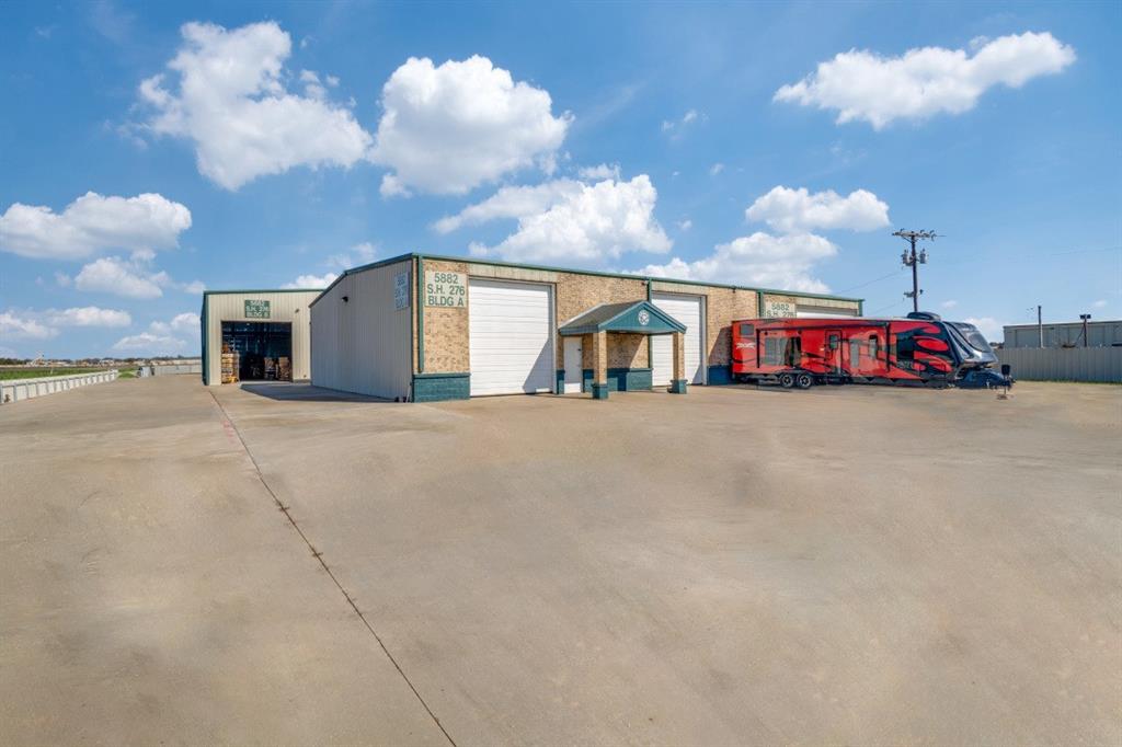 The property consists of two industrial warehouse buildings constructed in 2004 and 2021 with approximately 12,020 sf of
gross building area and is situated on 1.49 acres that are fenced in. 
The buildings consist of class S metal frame siding with a brick fascia on the front building. The building improvements are situated on the north side of State Hwy 276, southeast of Rockwall and south of Royce City.
Building A, constructed in 2004, has 3 oversized garage doors large enough for an RV.  Building A has an attached reception area,  3 offices and 2 bathrooms with shower and laundry area.
Building B, constructed in 2021 has 2 oversized garage doors and is currently used as a storage warehouse. 
The property is located in an unincorporated area outside the city limits of Rockwall and Royce City in Rockwall County which does not have an official zoning ordinance.