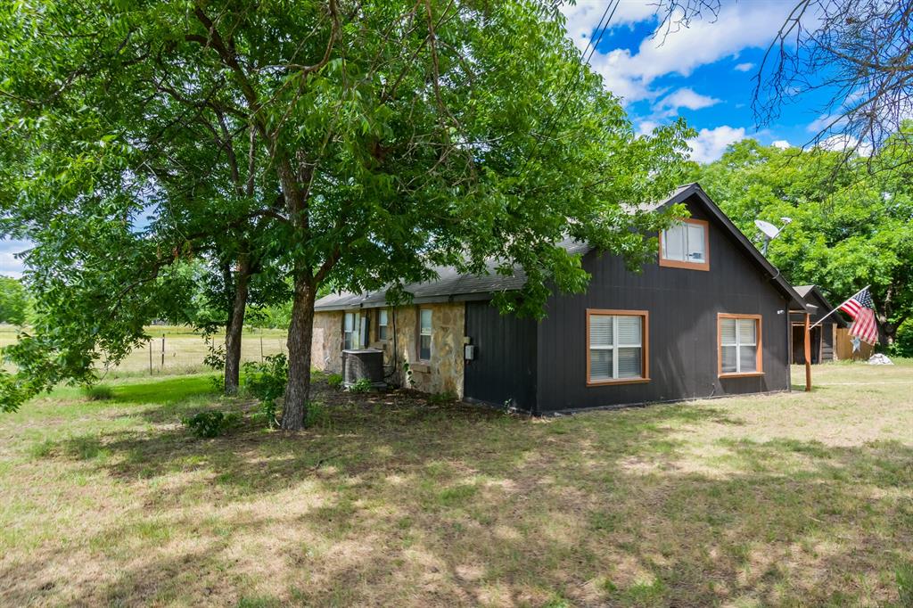 ****$5,000****  ANY WAY THE BUYER WANTS IT!!!

Discover this beautifully updated 3 or 4-bedroom, 1-bathroom home in the heart of Clyde, TX, where modern comfort meets practical living. This residence is perfect for those seeking a blend of stylish interiors and ample outdoor space, complete with a 2-car garage for convenience.

Step inside to a warm and inviting interior featuring all-new flooring and fresh paint throughout, ensuring a contemporary ambiance. The large living room offers a spacious setting for both everyday living and entertaining, with plenty of natural light to create an airy atmosphere. The kitchen, a true highlight, boasts granite countertops complemented by an abundance of cabinetry for all your storage needs, providing both style and functionality.

The thoughtful design extends to the primary suite, offering ample space and privacy, while the additional bedrooms are generously sized, perfect for guests or office use. Each bathroom is tastefully updated, reflecting a modern aesthetic and attention to detail.

Outside, this property truly shines. Spread out on a sizable lot, you'll find room to breathe and endless possibilities with three water wells on site—ideal for gardening or any other outdoor projects you have in mind. Additionally, the property includes a dog kennel, perfect for pet lovers, and an equipment or loafing shed, offering versatile space for storage or hobbies.

With all these features combined, this Clyde home stands as a perfect sanctuary for those seeking both comfort and functionality in a peaceful setting. Experience the best of both worlds with a home that's move-in ready and equipped to handle all your lifestyle needs.