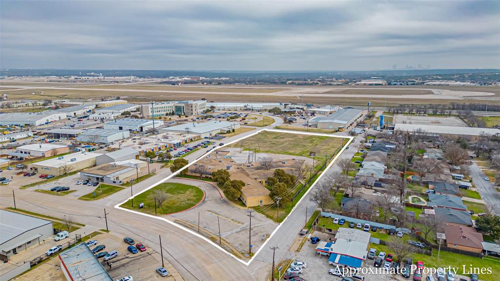 Prime 38,000 SF Commercial Facility on 4 Acres in Fast-Growing White Settlement, TX - THOUSANDS OF CARS DRIVE BY DAILY. 

Amazing opportunity to expand your business in the thriving City of White Settlement! Located just minutes north of I-30 on a main street corridor, this property boasts approximately four acres of land with no floodplain and stunning downtown Fort Worth views.

The 38,000-square-foot facility features dozens of private offices, multiple restrooms, several meeting and conference rooms, and a large kitchen area with a walk-in freezer—perfect for a restaurant, employee cafeteria, or catering business. Additional amenities include multiple laundry facilities, extensive storage and data space, and fire sprinklers throughout.

Parking is plentiful with room for growth, including approximately two acres of raw land ideal for expansion or additional parking. The building’s single-story layout offers flexibility for various business uses and is easily divisible into multiple lease spaces.

Conveniently situated with quick access to I-30 and Loop 820, this location provides excellent connectivity across Tarrant County and beyond—north to Johnson County and west to Parker County.

Endless possibilities await: retail center, office complex, business headquarters, or even a new home subdivision (subject to rezoning and city approval).

Dream it! Design it! Make it happen!