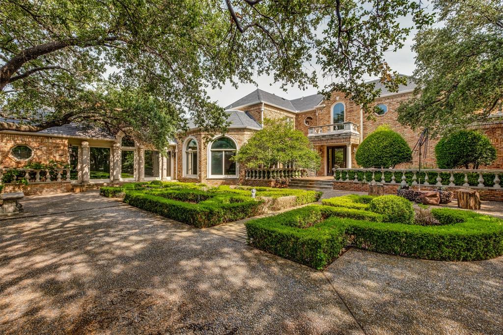 Live in luxury of Caruth Homeplace on a stunning-one of a kind lot. Enter the gated courtyard to the main house entrance & then enjoy the view through walls of floor to ceiling windows as the house wraps around it's treed private serenity. House sits at rear of community next to the fountain.
Floorplan is in online docs.