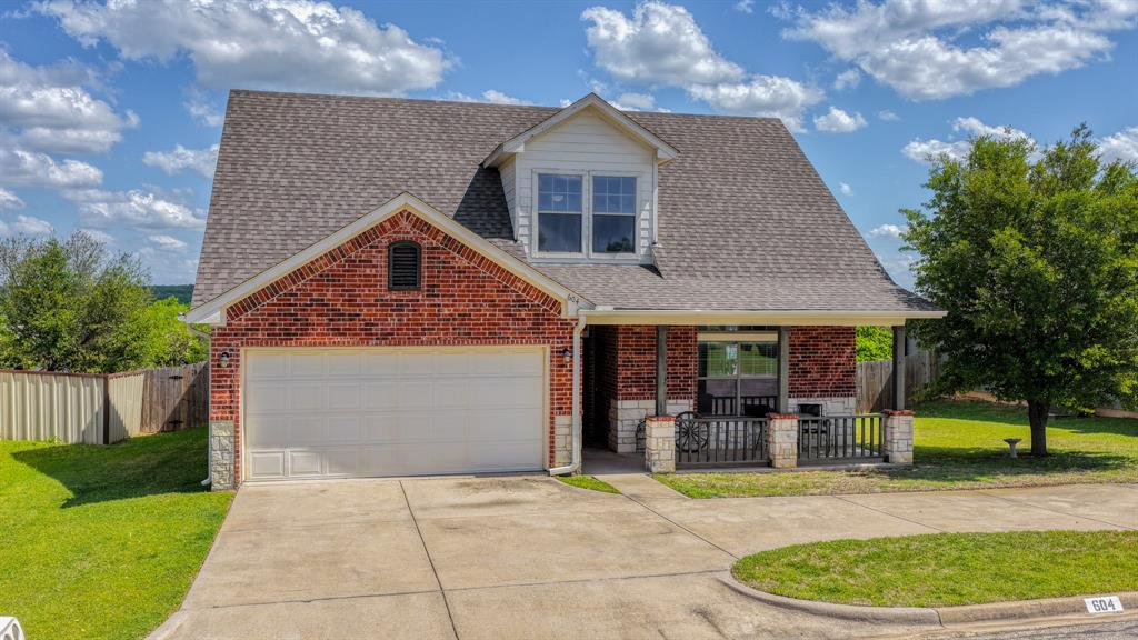 Roof is getting replaced and if you act fast you can pick the color of shingles on your new home! Nestled just off Holiday Hills Golf Course, this beautifully maintained 4-bedroom, 2 full bath, and 1 half bath brick home offers the perfect blend of comfort, style, and convenience. The spacious open-concept layout that seamlessly connects the kitchen, living, and dining areas—ideal for both everyday living and entertaining. The kitchen boasts abundant cabinetry and generous counter space, providing both functionality and charm.
All bedrooms are generously sized, offering flexibility for family, guests, or a home office. Major updates provide peace of mind, including newer windows, an updated HVAC system, and the roof replaced in 2023. The garage features durable epoxy-sealed flooring, adding both style and practicality.
Step outside to enjoy a covered back patio overlooking a large, fenced backyard—perfect for relaxing or hosting gatherings.
Conveniently located just minutes from the growing historic downtown Mineral Wells, nearby state park, and less than an hour from Possum Kingdom Lake, this home also offers easy access to Weatherford and Fort Worth—making it an ideal balance of small-town charm and modern accessibility. Txt keyword ZEAL7 to 88000 for Virtual Tour & more!