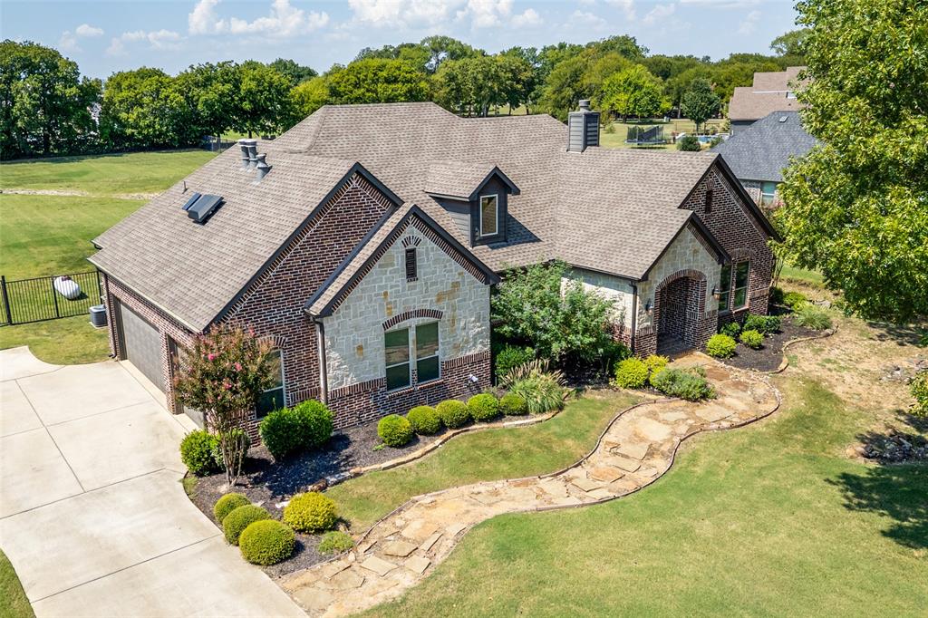 Welcome to this immaculate 3 bedroom 2.5 bath custom built home with private home office built in 2017.  This is one of the newest built homes in prestigious Hidden Lakes Ranch.  Move-in ready.  Outside the city limits, no city taxes.  Gunter ISD.  This home has it all. Ten foot ceilings, hand-scraped wood floors throughout, frest paint, wired for security, double oven, Bosch appliances, tankless water heater, sprinkler system front and back yard, propane, solid wood doors, spray foam insulation, so much built in storage, Tesla charger, insulated garage doors, wood burning fireplace with propane starter.  Do not miss your opportunity to own this beauty.  Schedule your showing today to see for yourself.