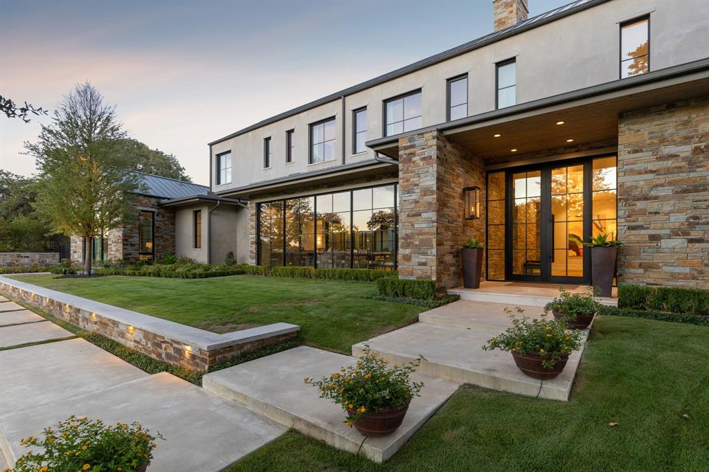 Welcome Home to Westlake's Prestigious Quail Hollow and this Stunning Contemporary Masterpiece!!! Built by Cary Hy Custom Homes & designed by SHM Architects & G. Bradley Alford Designs, this Modern, Luxurious home boasts open-concept living at its finest with an abundance of windows to enjoy view to the beautiful front grounds, and to the Gorgeous Claffey pool, spa and private backyard. Highest-end Designer finishes and exquisite Architectural details throughout. Enter to a gorgeous welcoming Foyer to then step into the Great Room with tons of natural light and walls of glass. The Chef’s Dream Kitchen boasts Dacor appliances, 2 dishwashers, warming and steam oven + built-in seating banquette perfect for gatherings of all sizes.  The Owner’s Retreat is a dream with beautiful backyard views, a private Den, attached Exercise room, plus a resort style Spa Bath with heated floors, steam shower, coffee bar, luxury tile and wallpaper, plus 2 walk-in closets. A Private Guest Suite with separate entrance is also downstairs and has private access. All 3 upstairs Bedrooms boasts en-suite Baths, beautiful designer finishes and walk-in Closets. The Game-Media room has a dedicated sound system + blackout shades. Home features include Lutron Control 4 System, ELEVATOR, LARGE SAFE ROOM plus a GENERATOR. HUGE outdoor living is complete with covered patio with electrics shades, gas grill, lush landscaping, turf yard around the pool, mature trees, ambient lighting, fire pit and heated Claffey pool, spa with stunning water features and a retractable pool cover.