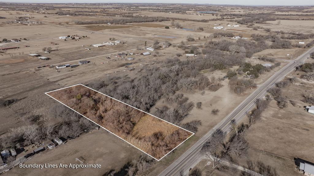 This attractive 2-acre parcel located approximately 10 minutes north of Stephenville offers a great blend of privacy and usability with NO restrictions. The property features a mix of open space and mature trees, along with a seasonal creek running through the tract, adding natural character and a peaceful setting. Freedom to use the land as you choose. Convenient access to Hwy 108 provides an easy drive to town while still enjoying the quiet of the country.