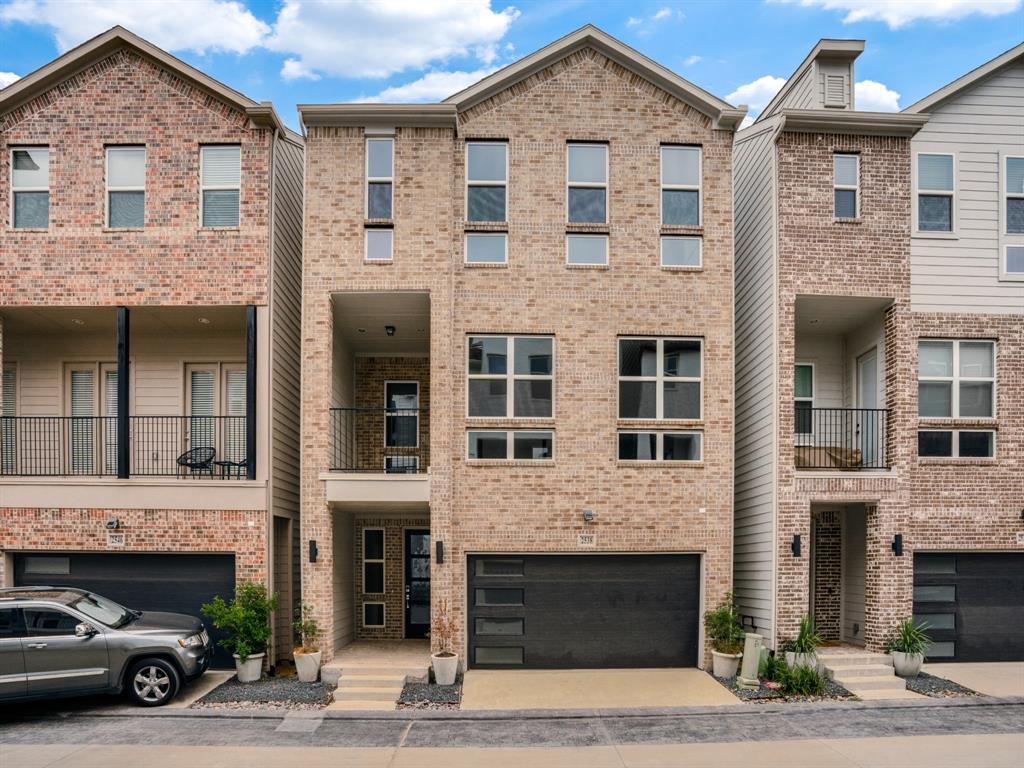 ** $10k Towards Closing Costs on Select Homes for a Limited Time Only When Using MCI Mortgage ** Brand New Construction by Megatel Homes! SoHo Square, located in the vibrant Trinity Groves area of Dallas, offers a one-of-a-kind living experience with the perfect combination of location and luxury. Residents enjoy access to a world-class amenity center, featuring a resort-style pool, fitness center, game room with kitchen setup, bowling alley, and a variety of games like pool, golf simulator, shuffleboard, and ping pong. Select units offer stunning rooftop views of Downtown Dallas, and all homes include private backyards with low-maintenance artificial turf. Move In Ready & Never Occupied! Experience the stunning Megatel Homes Manhattan plan in the heart of Dallas! This exceptional 3-story home features a Roof Top Deck, 3 spacious bedrooms, 3 and one half baths, a covered balcony, and a 2-car garage. The open-concept floor plan showcases sleek, modern finishes and smart home capabilities, creating the perfect space for both relaxation and entertaining. Enjoy outdoor living with a low-maintenance artificial turf backyard and a second-floor balcony, ideal for unwinding. Each bedroom is designed for comfort, with an ensuite bath and generous closet space. The luxurious master suite offers a spa-like bathroom with a large shower, providing a peaceful retreat.