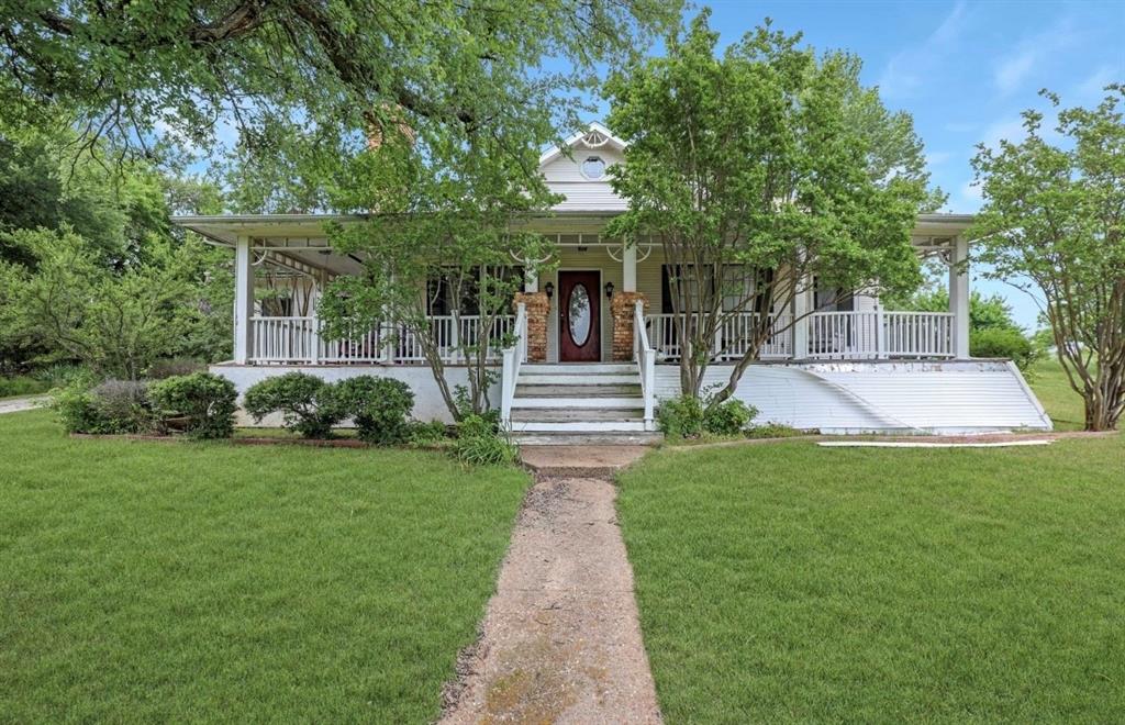 31 Acres in Farmersville Texas! Ideally located 1.5 miles to the high school, 2 miles from the quaint downtown and less than 10 miles from the fastest-growing city in the U.S.  This beautiful setting offers incredible value with the majority of its worth tied to the expansive land. The property boasts lush green fields, a serene pond, and mature trees, creating a picturesque setting ideal for farming, recreation, or future development. The existing home, while in need of some tender loving care, it presents a fantastic opportunity to restore and revive its original charm. Featuring a spacious layout with a welcoming front porch and a cozy front patio, this residence could once again become the heart of the property with the right renovations. The land also includes a rustic barn, adding to its versatility.
Located in a community renowned for its top-rated schools, this property is perfect for families or investors looking to capitalize on its prime location and growth potential. Don’t miss out on this rare chance to own a slice of Texas countryside with endless possibilities! All information to be verified by buyers agent.
Key Features:
•  31 acres of fertile land
•  Existing home with renovation potential
•  Serene pond and mature trees
•  Rustic barn for storage or livestock
•  Access to incredible Farmersville schools
Contact us or your agent today to schedule a viewing and explore the opportunities this unique property has to offer!