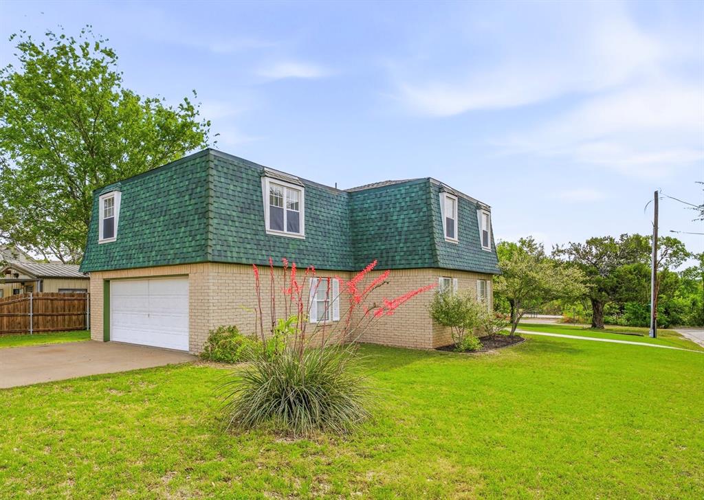 Discover the perfect blend of small-town charm, modern comfort, and investment opportunity in the heart of Glen Rose! Ideally located just a short stroll from historic downtown, this spacious 4-bedroom, 4.5-bath home puts you within walking distance of local dining, boutique shopping, and year-round entertainment. Designed with both everyday living and guest hosting in mind, the home features an open and inviting main level with a generous living area, dining space, and a well-appointed kitchen—perfect for gatherings. A convenient half bath and versatile flex room offer endless possibilities for a home office or sitting room. Upstairs, you’ll find four bedrooms, each with its own private ensuite bath, providing comfort and privacy for family members or guests—an ideal setup for a high-performing short-term rental. Recent updates, including newer flooring and fresh paint, add a clean, modern feel throughout. Outside, enjoy a fenced backyard and a two-car garage for added convenience. What truly sets this property apart is the rare bonus: an additional lot! Expand your vision by building a second residence, creating an outdoor oasis with a pool or pickleball court, adding extra parking for guests, or simply enjoying an expansive yard. With its unbeatable location in one of Glen Rose’s most desirable areas, this property offers exceptional potential as a primary residence, vacation home, or income-producing VRBO-Airbnb. Opportunities like this are few and far between—don’t miss your chance to own a piece of Glen Rose just steps from it all!