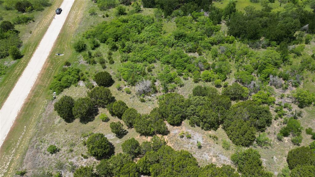 Discover your own Texas retreat just minutes from the calm waters of Possum Kingdom Lake. This 2.01-acre property presents a unique chance to own land in one of the state’s most desirable destinations.Ideally located near the lake, you’ll enjoy easy access to outdoor activities like boating, fishing, and hiking, all set against a backdrop of scenic beauty. Picture spending your days exploring the outdoors and creating lasting memories with family and friends.Whether you’re looking for a weekend escape or a place to call home full-time, this property offers the flexibility to bring your vision to life. With plenty of space to build your dream home or getaway, you’ll be surrounded by peaceful landscapes and stunning views—an ideal setting to unwind and step away from the pace of everyday life. The property is part of a homeowners association (HOA), helping maintain the quality and appeal of the neighborhood.