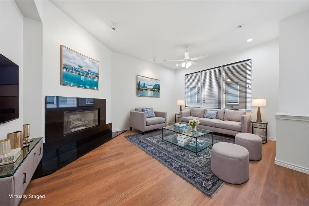 This recently renovated condo in the highly sought-after Knox Henderson area offers 2 bedrooms, 2 full baths, and 1 half bath in 2,049 square feet of thoughtfully designed living space. The first level welcomes you with a guest bedroom with ensuite bath and provides convenient access to the attached 2-car garage. Upstairs, the second level is bright and open, featuring an updated kitchen open to the dining area. The generous kitchen with crisp white cabinetry boasts a center island, gas cooktop and ample cabinet space. The light-filled living room with a fireplace is accented by beautiful wood floors. A convenient half bath completes the second level. The third level is dedicated to the expansive primary suite, complete with a sitting area. The beautifully renovated bathroom includes a soaking tub, large separate shower with marble tile, dual sinks and a walk-in closet. Full-size utility closet is conveniently located next to the primary suite. A hallway door opens to a private deck, offering a quiet outdoor retreat. Located near dining and shopping in the Knox Henderson area and just steps from the Katy Trail, this home offers a location that can’t be beat! Crisp and clean, this home is ready for you to move right in!