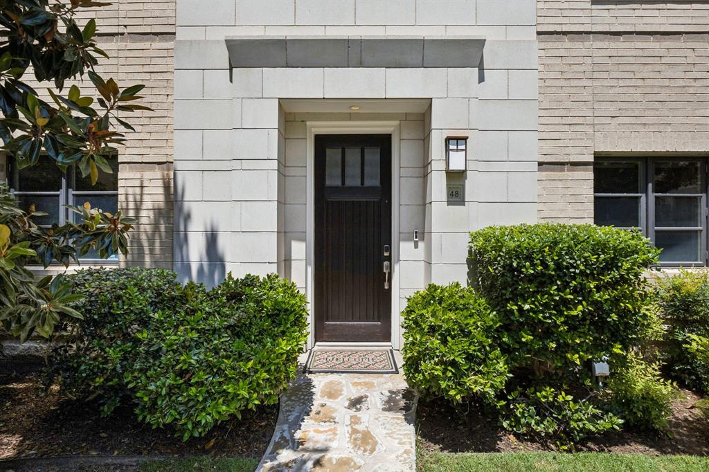 Tucked away in the heart of Uptown, 3210 Carlisle St #48 offers a rare blend of quiet privacy and walkability to all of your favorite Dallas spots. Situated directly across from the Katy Trail, you have easy access to start your days with a run or end your days on the trail. This two bedroom home has a long list of recent updates including new paint, new carpet, custom window treatments, custom California Closet system in both the large walk-in primary and linen closet, and so much more. The open concept living room and kitchen features tall windows, an updated kitchen with stainless steel appliances, and a half bath conveniently located on the same floor. The primary suite features a large ensuite bathroom with updated mirrors and lighting, a tub, walk-in shower, separate vanities, and a private water closet. The rooftop terrace offers you a private space to relax while taking in skyline views. Don’t miss this one!
