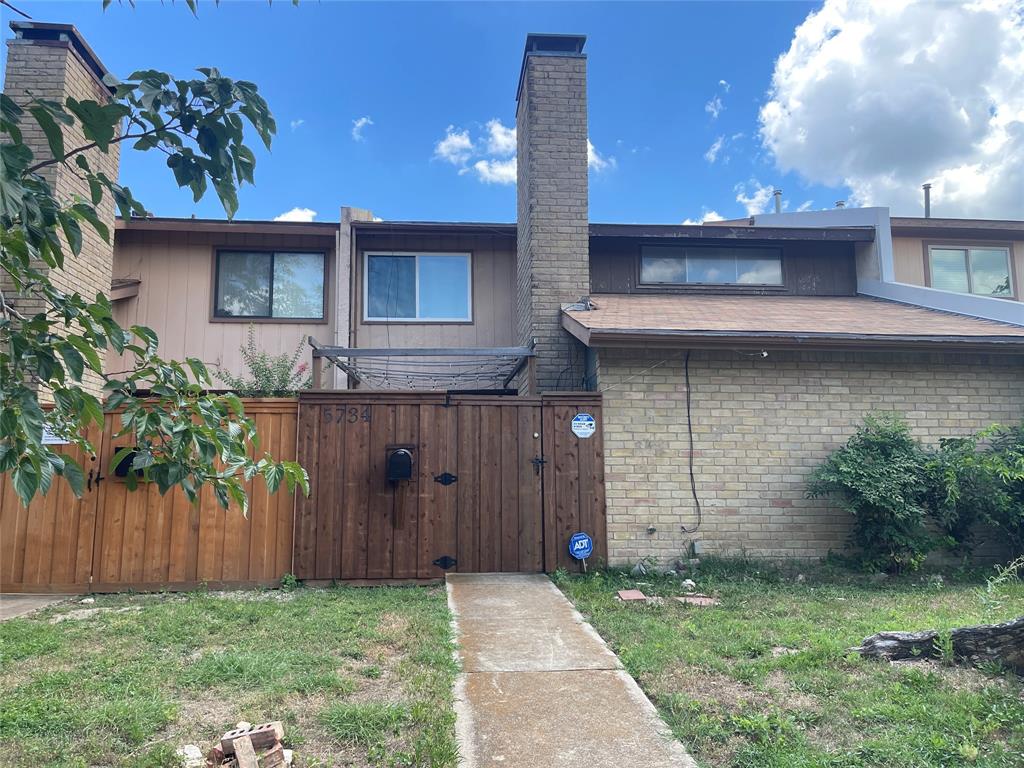 STUNNING!REMODELED! 2 bedroom with OPEN floor plan -small green backyard that is mowed by the HOA. Updated  kitchen with granite, new cabinets,appliances,double SS sink,ceiling fans,travertine tile floor in  kitchen,half bath,and dining rm can be 2nd living area. New vinyl tile floor in living-den,Stack utility in Kitchen. New SS Refrig,New Wash Dryer, Iron rod stairs add striking glamour with all new Travertine covered brick wood burning fireplace. HOA mows lawns. Storage Shed in backyard negotiable.  Within the ERUV, close to St. Rita's.A GEM!v- Owner-Licensed Texas Realtor Diane Benjamin