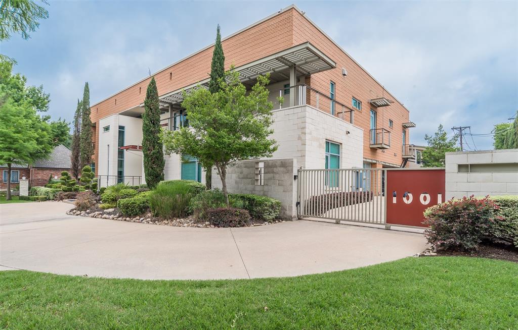 This stunning contemporary home sits gracefully on a prominent corner lot, offering a striking modern design that thoughtfully separates everyday living from entertainment. Bedrooms are tucked privately on one side of the home, while the chef-inspired kitchen and expansive living areas flow together on the other. The kitchen showcases elegant pendant lighting, Viking appliances, and clear views of the backyard oasis. Warm interior tones, recessed lighting, tall ceilings, and floor-to-ceiling windows in the living room create a bright, inviting atmosphere, enhanced by a large built-in aquarium perfect for Nemo and all his fish friends. The living room’s breathtaking window wall frames spectacular views of the resort-style pool, which can also be enjoyed from the kitchen, dining room, primary suite, and the dramatic catwalk balcony. The second floor is an entertainer’s dream, ideal for sports lovers and movie enthusiasts alike. It features a true movie-style media room, a spacious gameroom, and a large wet bar with an elongated serving counter—perfect for hosting game nights, watch parties, or relaxed gatherings. From this upper level, guests enjoy direct access to the balcony overlooking the resort pool, creating a seamless indoor–outdoor experience. Outside, the home transforms into a private paradise with an outdoor kitchen, sparkling pool with a waterfall and hot tub, relaxing cabanas, a putting green, and a spiral staircase leading effortlessly to the upstairs balcony. The primary bedroom offers a luxurious retreat with a tray ceiling, cozy fireplace, walk-in closet, private patio, and tranquil pool views, while additional bedrooms provide generous space, walk-in closets, and ensuite bathrooms. Completing this exceptional property is a spacious 4-car garage with ample room for vehicles, tools, and storage—making this modern masterpiece as functional as it is beautiful.