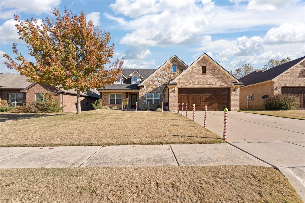 Finding your forever home just became a reality at 3137 Shoreline Drive, a stunningly reimagined residence perfectly tailored in the heart of the Mountain Valley subdivision. Imagine summer afternoons at the community pool or fish at the neighborhood’s ponds, all just steps from your front door. The massive backyard is a private sanctuary, backing directly to a lush greenbelt that ensures no rear neighbors and provides a safe, scenic backdrop for outdoor play and gatherings. Inside, the thoughtful layout balances connection and privacy. The first floor features three spacious bedrooms and a dedicated home office (or 5th bedroom) with elegant French doors—perfect for a quiet homework space or a remote work hub. Upstairs, the oversized upstairs suite offering over 450 square feet of space for a secondary primary suite, game room, media room, or anything else you can imagine. Every inch of this home feels brand new thanks to extensive 2023-2024 updates, including a new roof, gutters, and designer flooring throughout. The heart of the home is the remodeled kitchen, which now features an expanded breakfast bar where you can gather for morning pancakes or evening chats. Modern touches like new light fixtures, fresh paint, and beautifully tiled shower in the upstairs bath add a touch of luxury to daily life. For added security, a sub-panel was recently installed to accommodate a whole-house generator (not included). With its striking stone-and-brick curb appeal and a location that prioritizes community and nature, this is more than just a house—it is the perfect stage for your next chapter.