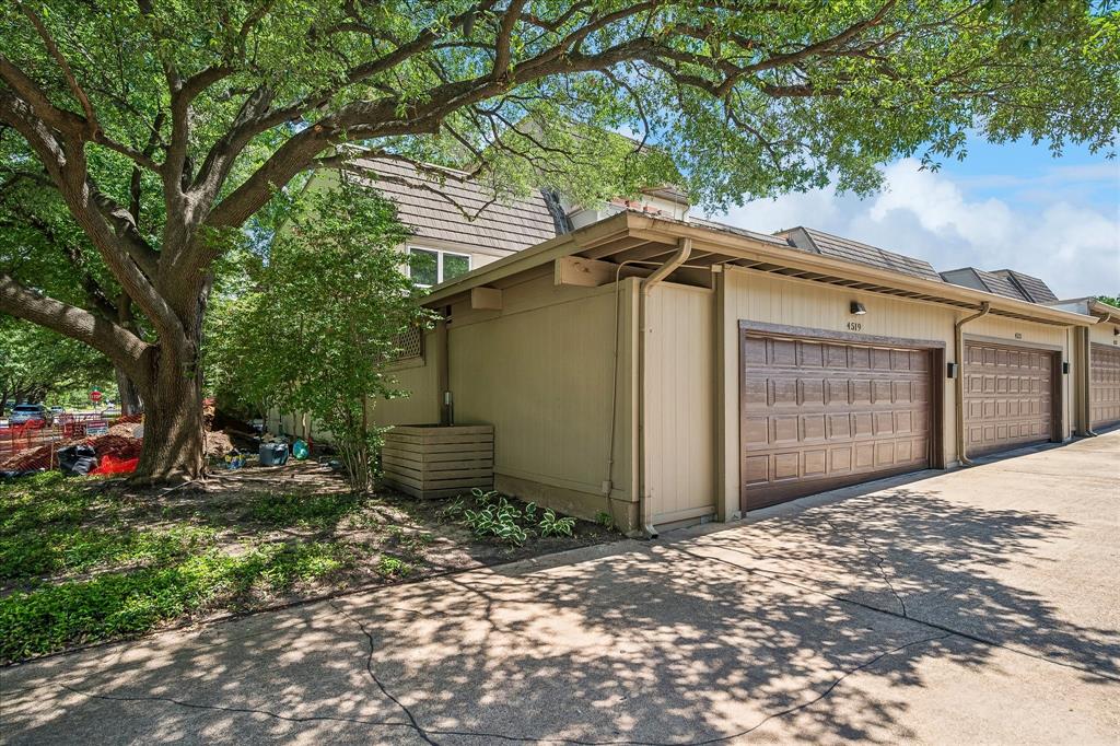 End unit townhome in the heart of Perry Heights in Oak Lawn offers 3BR, 2 full BA, 1 half BA, 2 living areas, attached garage, and exceptional updates throughout. Recent paint throughout, newer carpet upstairs, and vinyl windows installed. The updated kitchen features stainless steel appliances, refrigerator, built-in microwave, quartz counters, and a large breakfast area. The enclosed patio creates a second living-family room open to the kitchen, a rare bonus space not found in comparable units. The updated half bath on the main level also includes full size washer and dryer hookups for added convenience. The primary suite offers an ensuite bath with walk-in shower and large walk-in closet. Two guest bedrooms have generous closets and share a recently updated full bath upstairs. The garage has been partially converted into a fully finished storage room with built-in cabinets; currently fits 1 car. The cedar lined finished attic provides ample additional storage. HOA covers electricity, water, sewer, gas, trash, HVAC maintenance and replacement, roof and gutter care, exterior building maintenance, 24-hour emergency service, quarterly pest control, exterior insurance, professional landscaping, on-site maintenance staff, and full community amenities including pool. Steps from dining, shopping like Whole Foods & Eatzi's, Craddock Park, and the Katy Trail. Easy access to Love Field, Dallas North Tollway, US-75, Uptown, and Downtown Dallas. True lock-and-leave living in one of Dallas' most walkable neighborhoods.