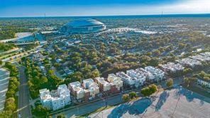 Within walking distance to all thing’s entertainment, this townhome is in the heart of Entertainment District and has luxe finish outs which provide both relaxation and convenience!  The combination of an opportune location along with a rooftop patio that has a view of both ATT Stadium and Globe Life Field can make it a unique and appealing option for residents. CALL TODAY and we can schedule a tour.