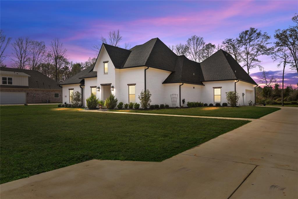 This immaculate farmhouse style home is truly move in ready and has been meticulously maintained. Featuring 4 bedrooms and 3 full bathrooms, including two spacious primary suites, this home offers flexibility and comfort for a variety of living arrangements.

The light and airy interior showcases an abundance of upgrades throughout, including a stunning Roman shower, a Butler’s pantry, and a massive laundry room designed for convenience and functionality. The oversized garage easily accommodates large vehicles and so much more!
Situated on a large lot, the outdoor living space is just as impressive. Enjoy the covered patio complete with a fireplace, outdoor kitchen, custom-installed screens to reduce sun glare and keep bugs at bay.

Additional upgrades include a sprinkler system and thoughtful enhancements throughout. This home combines pristine condition, high-end features, and farmhouse charm. a rare find.