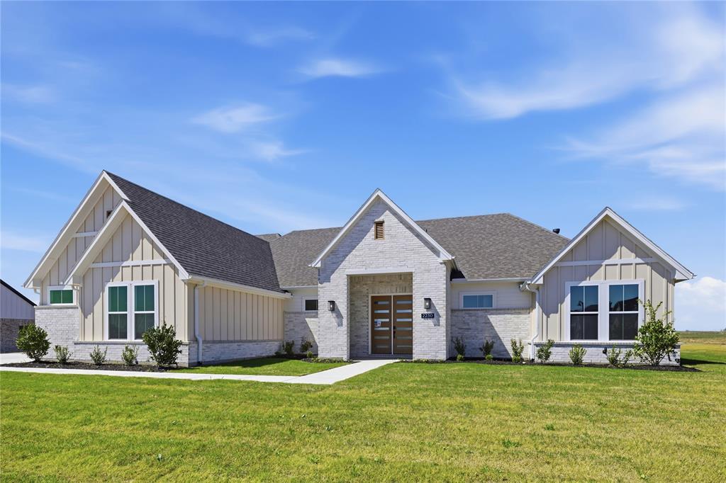 Set on just over an acre in Waterfall Ranch, 2230 Tutt Trail offers the space, privacy, and ease of single-story living in a thoughtfully designed new build. Inside, the open-concept layout is centered around a vaulted great room with clean lines, modern lighting, and a fireplace with a simple surround and mantle. Expansive windows bring in natural light and frame views of the surrounding property, while the space flows naturally into the dining area and kitchen—creating a layout that works well for both everyday living and entertaining.

The kitchen features rich cabinetry, a large quartz island with seating, stainless appliances, and a streamlined tile backsplash, offering a balance of function and design. Nearby, the dining area is positioned for easy access to the patio and backyard. The private primary suite is set apart with a quiet, comfortable layout and a well-appointed bath complete with dual vanities, a soaking tub, walk-in shower, and modern finishes. Two additional bedrooms are supported by two full baths, while a separate game room provides flexible space for media, work, or a playroom.

Wide-plank flooring runs through the main living areas, complemented by soft neutral tones and abundant natural light throughout the home. With over an acre to work with, the property offers the flexibility to expand over time—whether that means adding outdoor living, a pool, or simply enjoying more space and privacy. A well-designed single-story home offering space, comfort, and flexibility in Waxahachie.