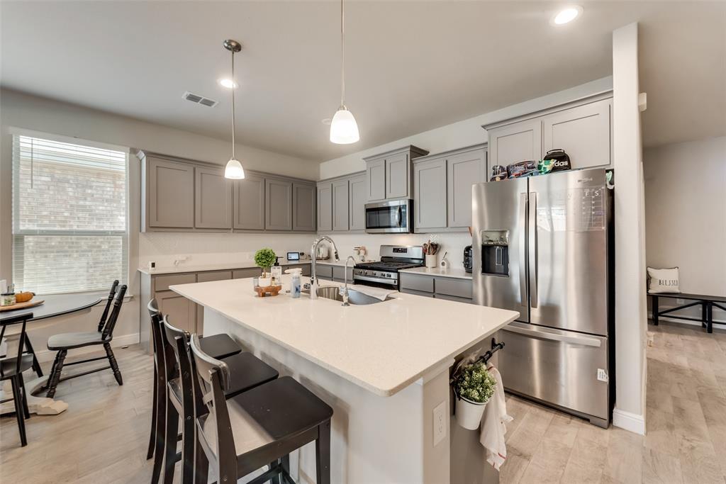 Welcome to your dream home! This beautiful 4-bedroom, 2-bathroom gem is like new and perfectly situated just off Highway 114. As you step inside, you'll be greeted by a spacious open-concept kitchen and living room area, making it the ideal space for family gatherings and entertaining friends.
But that's not all - you'll also find a versatile flex room that can be your formal dining room, a home office, or an additional cozy living room. The possibilities are endless! 
Water Osmosis system in the house. 
Neutral colors throughout the house create a warm and inviting atmosphere. And don't forget to step out into the backyard oasis, where you'll discover a covered patio that's perfect for relaxing and enjoying the outdoors. Community offers Pools, Club House  and Parks.  Walking distance to schools. 
This is more than a house; it's the perfect canvas for creating lasting memories.