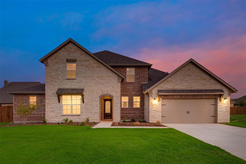 The covered front porch leads inside to a foyer, inviting you into the first floor of the home with a flex room right off the entrance. Stick with the standard flex room and closet or convert it into a study with french doors. Through the foyer you’ll find an open-concept living space, which includes the light-filled family room, dining area and gourmet kitchen. The kitchen features a large kitchen island, walk-in pantry and access to a mudroom with storage, separate laundry room, powder room and two or three car garage entrance. The family room features a grand corner fireplace, large windows and views of the covered back patio. A first-floor owner’s suite finishes off the main level, which includes a large bathroom with dual-sink vanity, water closet and spacious walk-in closet. The second floor of the Sabana opens up to a loft area that can be used as an informal living space or media room. Down the hall you’ll find two full bathrooms and three additional bedrooms with closets.