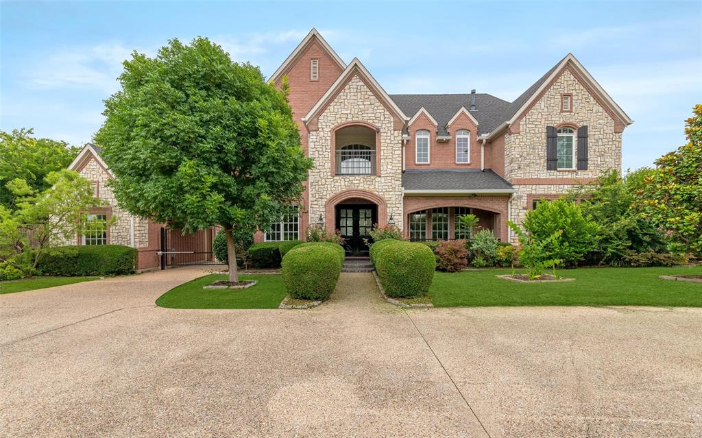 Set on an expansive .75-acre lot in Dallas’ coveted Private School Corridor, this exceptional property offers space, privacy, and endless possibilities. From the moment you enter, walls of windows frame picturesque views of the beautifully landscaped backyard, creating a seamless connection to the outdoors. Designed for both comfortable living and entertaining, the thoughtfully planned floor plan features an elegant formal living room with a fireplace and a gracious dining room just off the entry. The open-concept kitchen and breakfast area flow into the spacious family room, complete with a second fireplace and custom built-ins. The main level includes a private home office and a serene primary suite. Upstairs, three generously sized bedrooms provide ample accommodations, including two connected by a shared bath and a third with an adjacent full bath. A large game room with built-in bookcases overlooks the backyard, while an additional flex room offers versatility as a fifth bedroom, fitness room, craft space, or second office. The grounds are a true highlight, featuring mature native trees, productive gardens, fig trees, and blackberry bushes. Expansive decks extending from the living and family rooms create the perfect setting for outdoor entertaining and enjoying the tranquil surroundings. With ample room for a pool, pickleball court, guest house, or multigenerational living addition, the backyard presents a rare opportunity to create a customized retreat. The property also features a two-car garage and a separate one-car garage, both accessed through a gated driveway for added privacy and security. Ideally located directly across from the future home of Grace Academy and just minutes from Central Market, Claremont, and La Casa Rosa, this is a rare opportunity to own a substantial property in one of Dallas’ most desirable locations.
