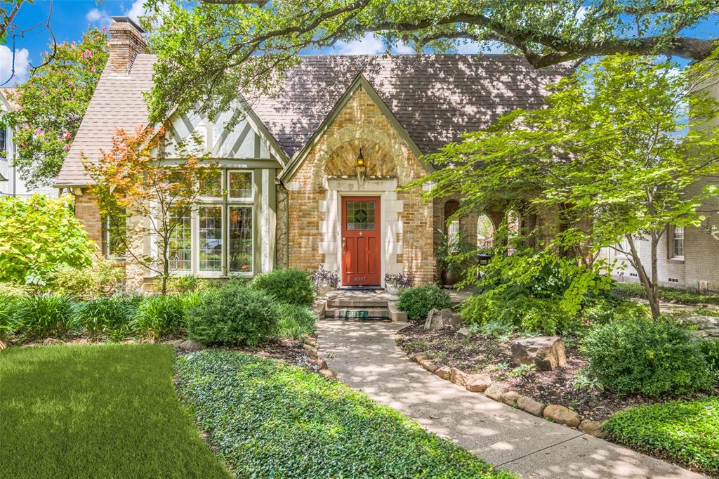 One of Lakewood's coveted 1920s Tudors, ideally situated in the heart of the neighborhood, this timeless home beautifully blends historic character with thoughtful updates. Mature landscaping and the signature covered side porch create exceptional curb appeal. A welcoming foyer opens to an elegant formal living room featuring a Rookwood tile fireplace, stunning stained-glass windows, and abundant natural light.? The spacious dining room flows into a charming breakfast room with the original Monday Morning broken tile floor and built-in buffet. The updated kitchen offers custom cabinetry, stone countertops, abundant storage, and premium stainless steel appliances, including a Sub-Zero refrigerator, gas cooktop, wine refrigerator, warming drawer, and upgraded water filtration system. A full-size laundry room with custom cabinetry adds convenience.? The primary suite features a walk-in closet and a beautifully renovated vintage-inspired bath. Two secondary bedrooms share an beautiful vintage-style bath, with one currently serving as a comfortable second living area or den.? The private backyard is an inviting retreat with a spacious deck overlooking a sparkling pool. An automatic gated driveway leads to an oversized garage topped with seller-owned solar panels, providing outstanding energy efficiency.? Recent improvements include a seller-owned rooftop solar system with Tesla Powerwall battery backup, new ridge-line shingles, rebuilt retaining wall behind the garage, new fireplace gas logs, garage door opener and remote, upgraded kitchen water filtration system, and an energy-efficient gas furnace with heat pump HVAC system. A rare opportunity to own a classic Lakewood Tudor with timeless architecture, modern amenities, and exceptional efficiency.