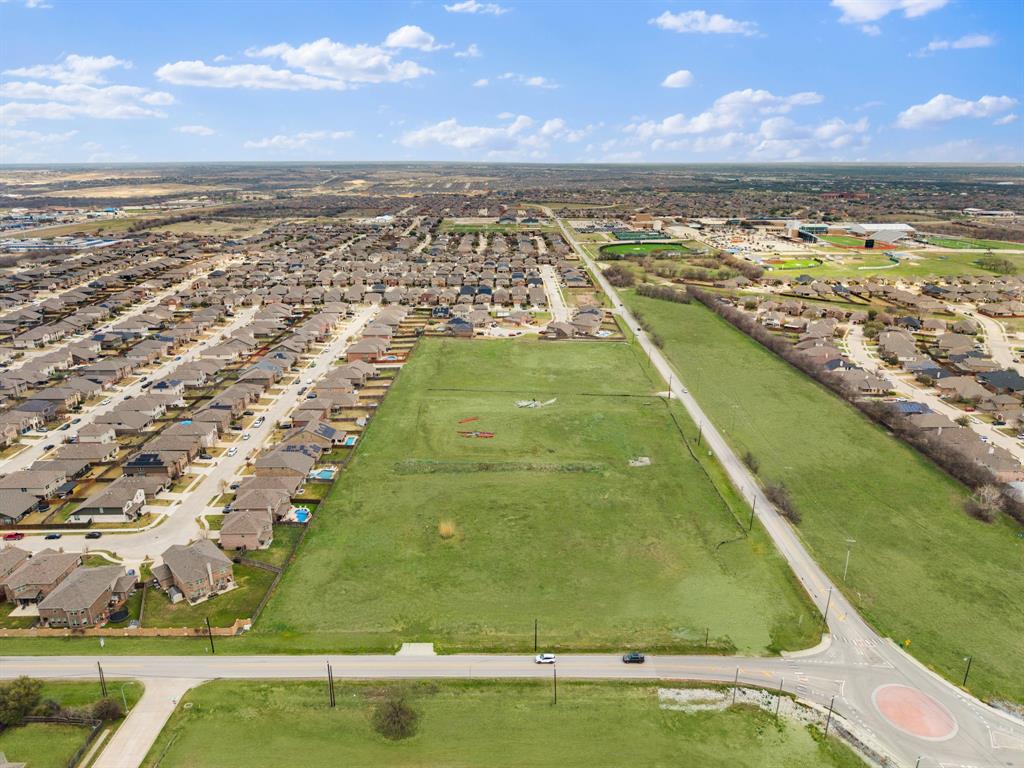 Approx. 10.52 acres of unimproved land located along Bowman Roberts Rd in North Fort Worth with frontage on both Bowman Roberts Rd and W.J. Boaz Rd. The property is currently zoned A-5 (Single-Family Residential) under the City of Fort Worth zoning ordinance and is identified in the Future Land Use Plan as Institutional (buyer to verify zoning, permitted uses, and development requirements).

The site offers strong visibility and access from two road frontages within an established and expanding residential area of North Fort Worth. City water and city sewer are already onsite, providing a significant advantage for future development. Electric service is available nearby (buyer to verify availability, connection requirements, and capacity). The land is generally level, and topographic information is available for reference.

Surrounded by established and expanding residential neighborhoods, schools, parks, and recreational amenities, the property benefits from continued growth throughout the surrounding area. The location may be suitable for single-family residential development or institutional uses such as churches or schools, subject to city approvals and verification.

The property has been held under long-term church ownership and carries a straightforward ownership history.

Buyer to verify zoning, permitted uses, utilities, acreage, access, and development feasibility.

All information deemed reliable but not guaranteed.