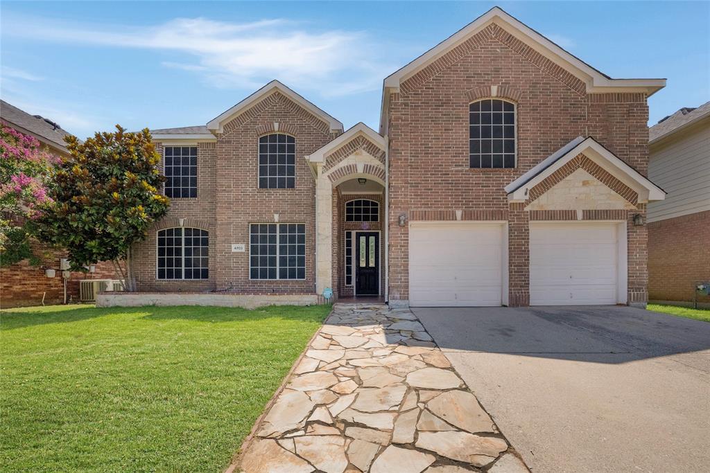 Welcome to 4703 Enchanted Bay Blvd in Arlington, a spacious and beautifully designed 5-bedroom, 3.5-bath home located in a highly desirable lakeside community with exclusive Lake Arlington access. Offering an exceptional floor plan, this home features two private primary suites, each with its own full bath, providing ideal flexibility for multi-generational living, guests, or extended family accommodations.

The main-level primary retreat is generously sized and showcases bay windows, a cozy sitting area, and a spacious ensuite bath. Designed for both everyday living and entertaining, the home offers multiple gathering spaces including a formal living room, formal dining room, dedicated sitting area, and a bright breakfast nook.

Step outside to enjoy the privacy of a greenbelt directly behind the backyard, creating a peaceful backdrop with no rear neighbors. Residents of this sought-after community enjoy outstanding HOA amenities including a private waterfront common area, covered lakeside pavilion, community boat dock, boat ramp with lake access, scenic views of Lake Arlington, sidewalks throughout the neighborhood, and beautifully maintained common areas. Whether you enjoy boating, fishing, kayaking, or simply relaxing by the water, this neighborhood provides easy access to the best of Lake Arlington recreation along with nearby parks and outdoor activities.

Combining generous living spaces, rare dual primary suites, lake access, and a prime location, this exceptional property offers a unique opportunity to enjoy lakeside living with all the comforts of home.