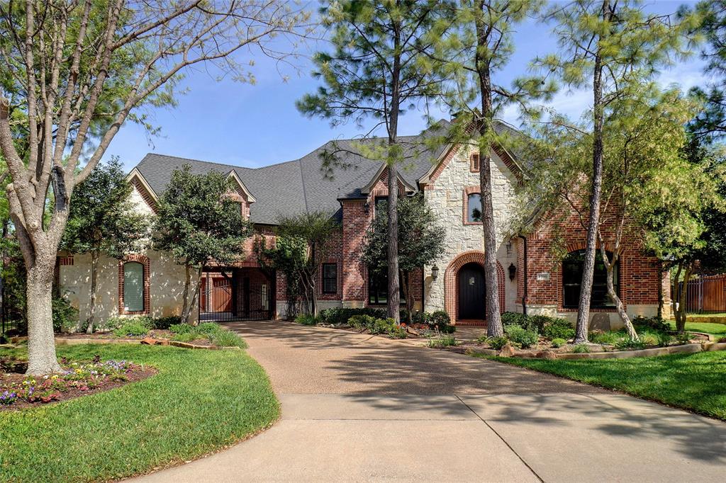 Custom 2 story in Timarron tucked away on exquisite cul-de-sac surrounded by mature trees & lush landscaping. Entertain year-round in beach entry pool, spa, slide, waterfall & outdoor living area, BI fireplace & gourmet pizza oven. Classy design has gorgeous wood floors, soft palette, open concept, spacious rooms with multiple living & dining. Private owner's suite overlooks backyard flora & trees, enjoy office or nursery, luxurious bath w steam shower, sep vanities & large WI closet. Gourmet kitchen offers SS appliances w gas cooktop, convection, BI Miele espresso-coffee, cabinetry w quartz counters & center island. Large game & media room has wet-bar, half bath & outdoor balcony. Large common spaces with lots of private space. Updates include landscape, whole house water filtration, interior paint, quartz counters & backsplash, kitchen, decorative LED lights w smart switches & wood floors. Every detail carefully crafted, making this unique & beautiful property a place to call home.