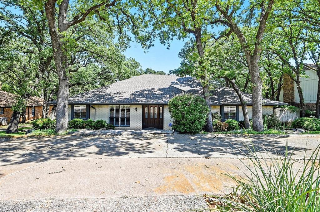 Welcome to 2201 Adams Dr in North Arlington! This spacious 5 bedroom, 3.5 bath home offers unique versatility and extraordinary comfort. All 5 bedrooms have brand new carpet installed March 2026! Located on an oversized lot with a refreshing pool, the property is perfect for large families or multigenerational living. Step inside and you’re greeted with beautiful views of the pool through large windows in the living room which also features a soaring skylight filling the space with warm natural light. Additionally, the living room contains gorgeous hardwood floors and a cozy gas fireplace that flows into a spacious kitchen equipped with expansive counters, a double oven, plenty of storage and a small dining area. The kitchen seamlessly leads to the formal dining room for memorable meals with family and friends. A flexible front room with tasteful plantation shutters makes the perfect office, sitting area, or playroom. With the primary bath being remodeled in 2017, the primary suite is a true retreat with two walk-in closets, a double vanity, dual shower, abundant storage, and direct access to the backyard and pool. Two additional downstairs bedrooms in proximity to the primary suite also offer sizable walk-in closets. Upstairs, a private wing includes two bedrooms and a full bath-ideal for guests, teens, or extended family. A versatile room with a vaulted ceiling and a half bath connects the levels and can serve as another home office, media room, play or game room. Practical features include 2 water heaters, a large utility room with space for an extra fridge, and an oversized two and a half car garage with room for a workspace and plenty of storage. The circle drive and long driveway provide plenty of parking, while the backyard offers a covered porch to enjoy lounging by the pool. Located in an established, tree-lined neighborhood just minutes from I-30, this home offers the perfect balance of space, function, versatility and convenience.