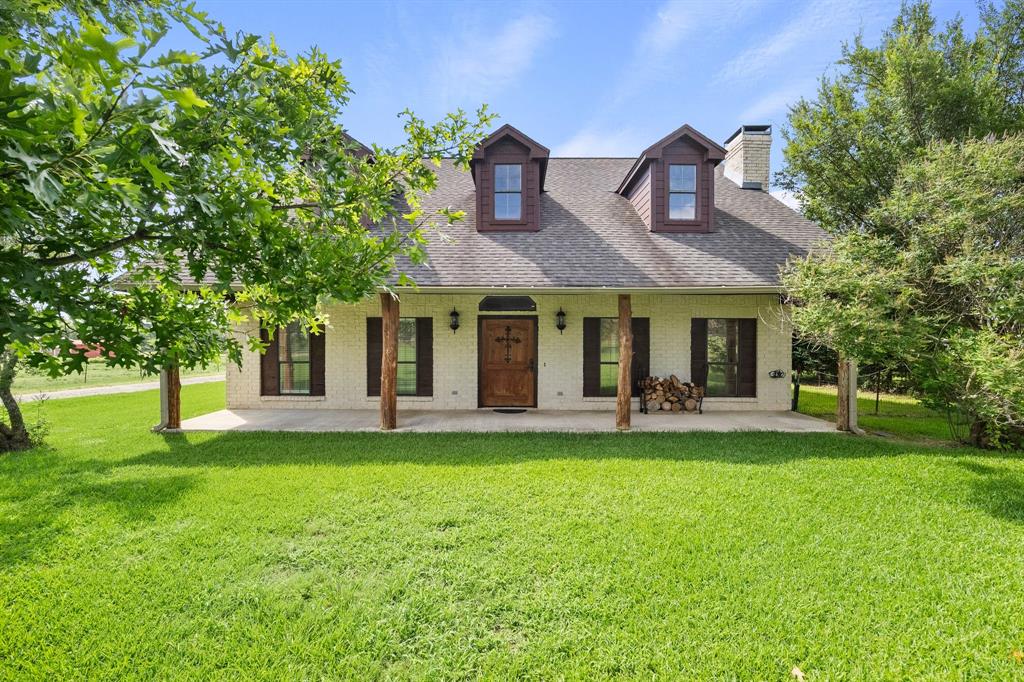 HORSE & LIVESTOCK-READY, AG-EXEMPT RANCH IN HEART OF POETRY, TEXAS! Discover the perfect blend of country living, equestrian amenities, & everyday convenience on this beautifuL 25.651-acre ranch in highly sought-after Poetry, Texas. Conveniently located with easy access to Rockwall, Royse City, Terrell, Greenville, Quinlan and major highways connecting the DFW Metroplex, this property offers the rural lifestyle buyers crave without sacrificing accessibility. A gated entrance welcomes you to a picturesque setting featuring a charming Texas Hill Country style home, two ponds, sandy loam soils, mature trees, & fenced & cross-fenced pastures ready for horses, cattle, or recreational use. The property is thoughtfully designed with a five-stall horse barn, storage area, run-in sheds, & a large stallion-safe paddock which could be used as an arena. The custom 3-2 Texas Hill Country-style home offers 2,050 SF of comfortable living space filled with rustic charm & character. The open-concept floor plan features easy-care stained concrete floors, handcrafted wood cabinetry, granite counters, SS appliances, gas range, stone fireplace, & expansive views. Large primary suite has ensuite bath with separate tub & shower & two closets. Secondary bedrooms share full bath with new walk-in shower. Outdoor living is equally impressive with large covered front & back porches designed for enjoying peaceful sunrises, evening gatherings & panoramic views. Two car attached carport, flagstone patio extension with stone garden, native landscaping, dog run & chicken coop. Whether you're searching for a horse property, hobby farm, cattle operation, weekend retreat, or full-time country residence, this turnkey ranch offers a rare opportunity to enjoy the beauty & lifestyle of Poetry while remaining close to shopping, dining & employment centers throughout NE Texas. Extra 1.85 acres included for your enjoyment on Dallas water line ROW, total 27.5 usable acres. Live the dream in Poetry, TX!