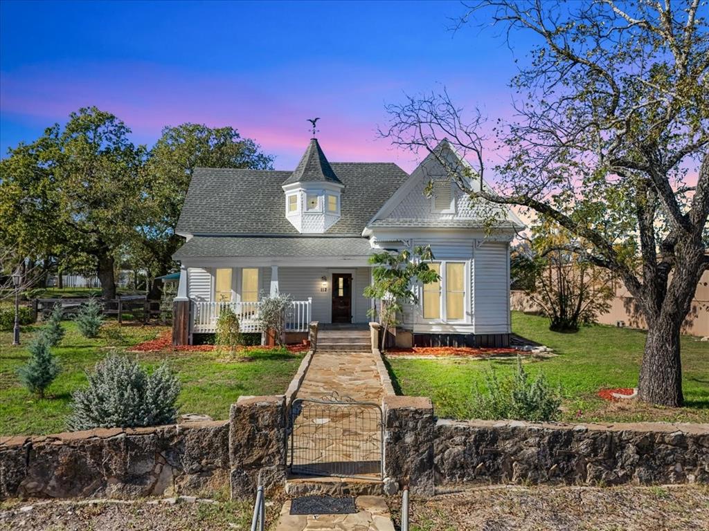 This charming 3-bed, 2-bath home, built in 1905, blends timeless character with modern comfort. Set on nearly half an acre, it offers the space and serenity of small-town living while keeping you just minutes from shopping, dining, and everyday conveniences. Inside, you’ll find beautifully preserved wooden floors, tall ceilings, and unique architectural touches that reflect the craftsmanship of a bygone era. Natural light fills each room, highlighting the home’s intricate details and warm, welcoming feel. The spacious kitchen and living areas provide an ideal setting for gatherings, while the bedrooms offer cozy retreats with historic charm. Outdoors, the expansive yard invites gardening, play, or simply relaxing under the trees. Full of history, style, and comfort, this home is the perfect blend of rural peace and modern accessibility. SOLD AS-IS HVAC replaced approximately in 2018-19, Roof is approximately 7-8yrs old, All plumbing was replaced approximately 2018-19, Electrician inspected in 2025 & there is no knob & tube in home, large water heater approximately 2yrs old. **BACK ON MARKET DUE TO BUYER'S CIRCUMSTANCES. NOTHING TO DO WITH HOME***